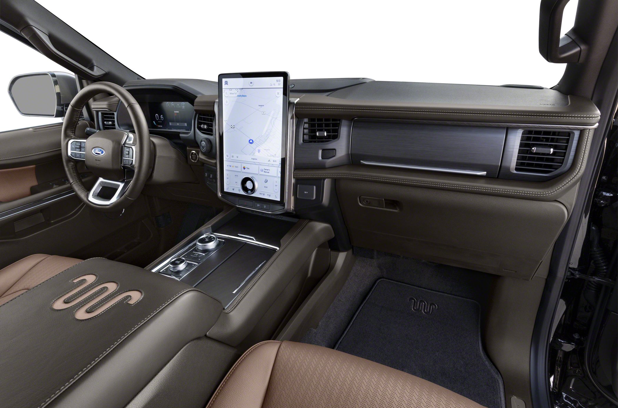 Large vertical touchscreen and digital dashboard in brown leather interior