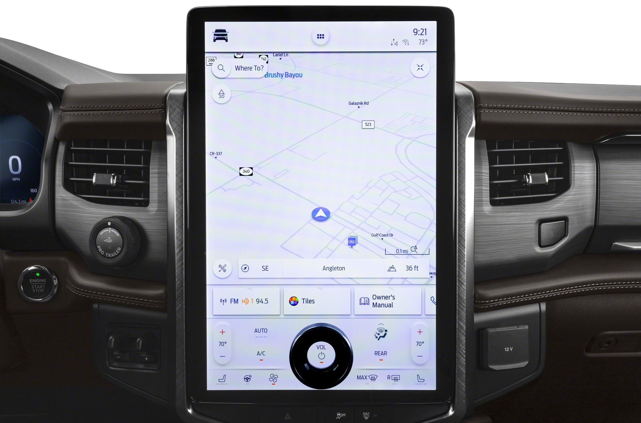 Large vertical touchscreen with navigation and climate controls in dashboard