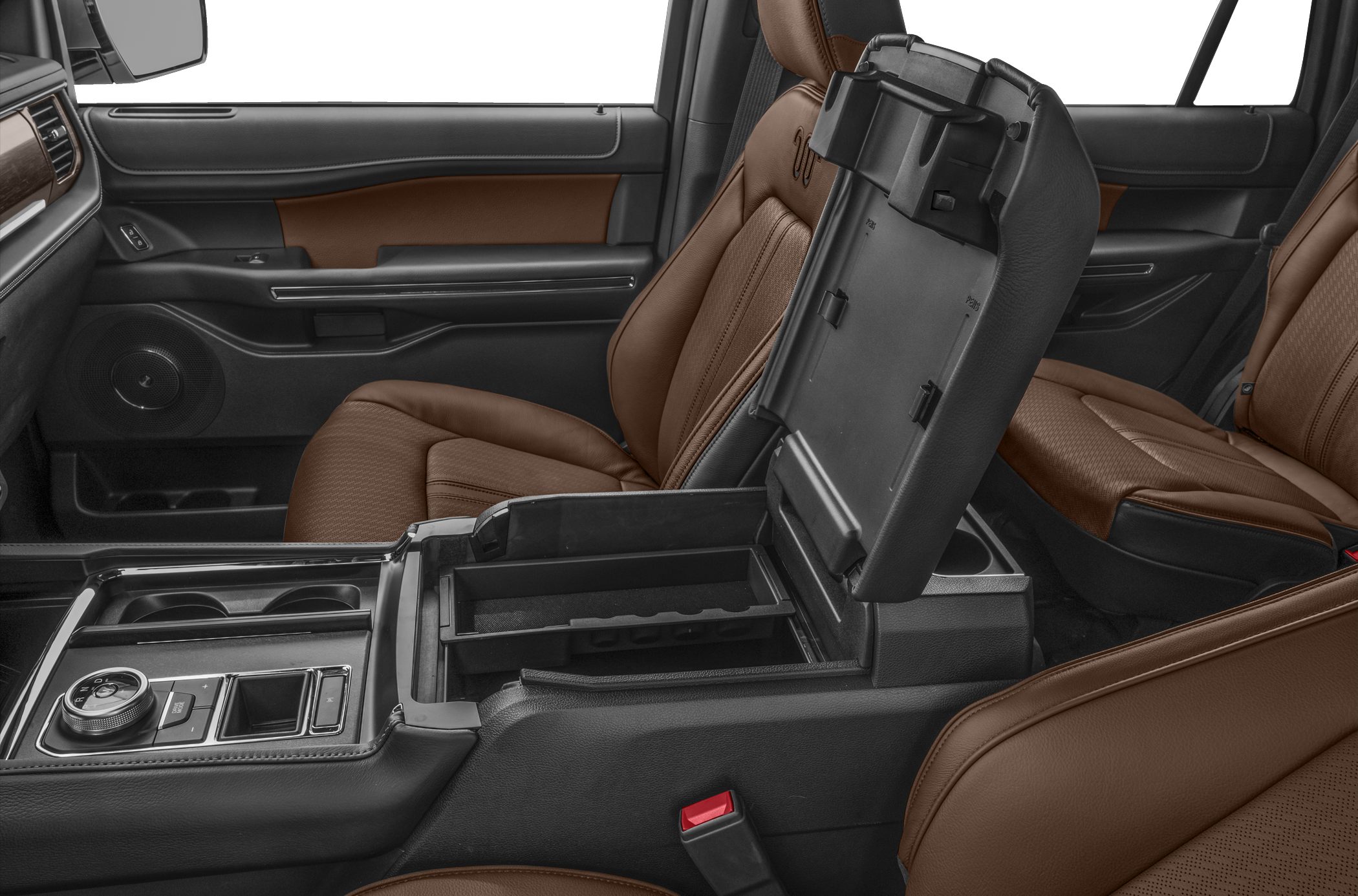 Interior with brown leather seats and open center console storage compartment