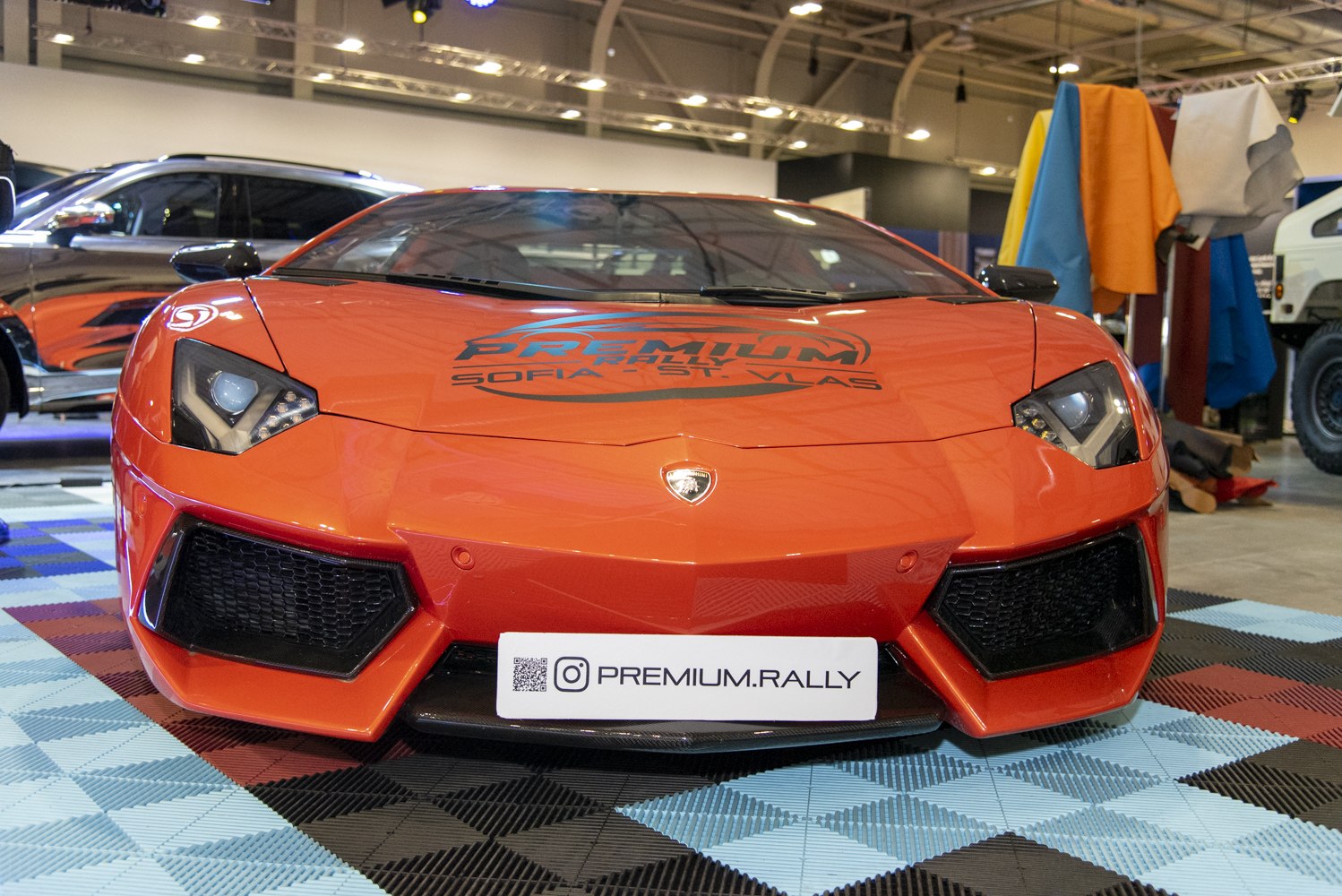 Aggressive front view with distinctive headlights and aerodynamic grille