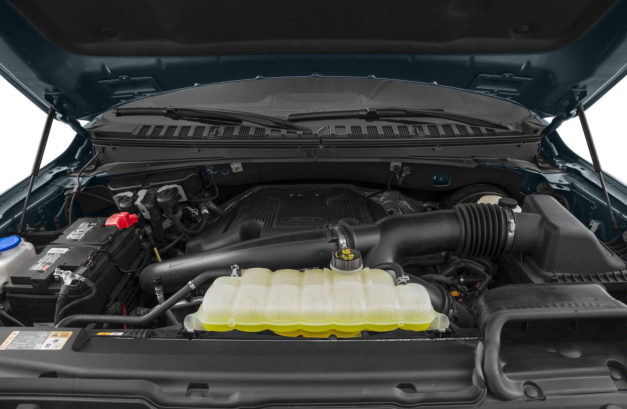 Engine bay with cooling system and air intake components
