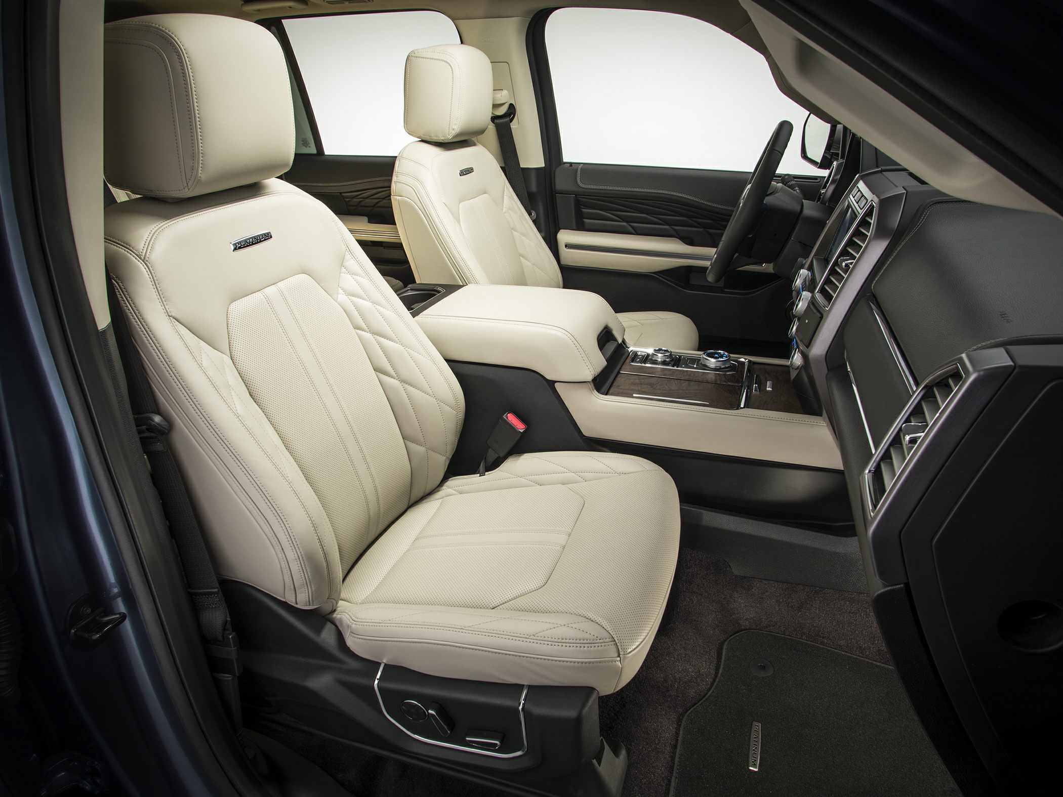 Premium leather front seats and modern dashboard interior with advanced controls