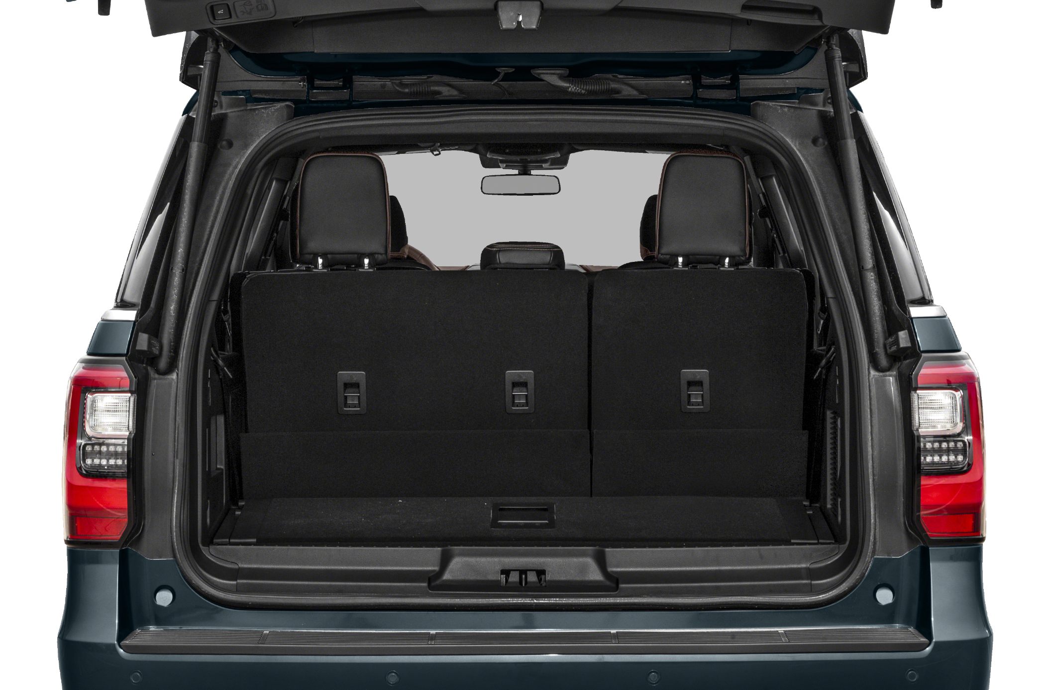 SUV rear cargo space with rear seats upright and open tailgate