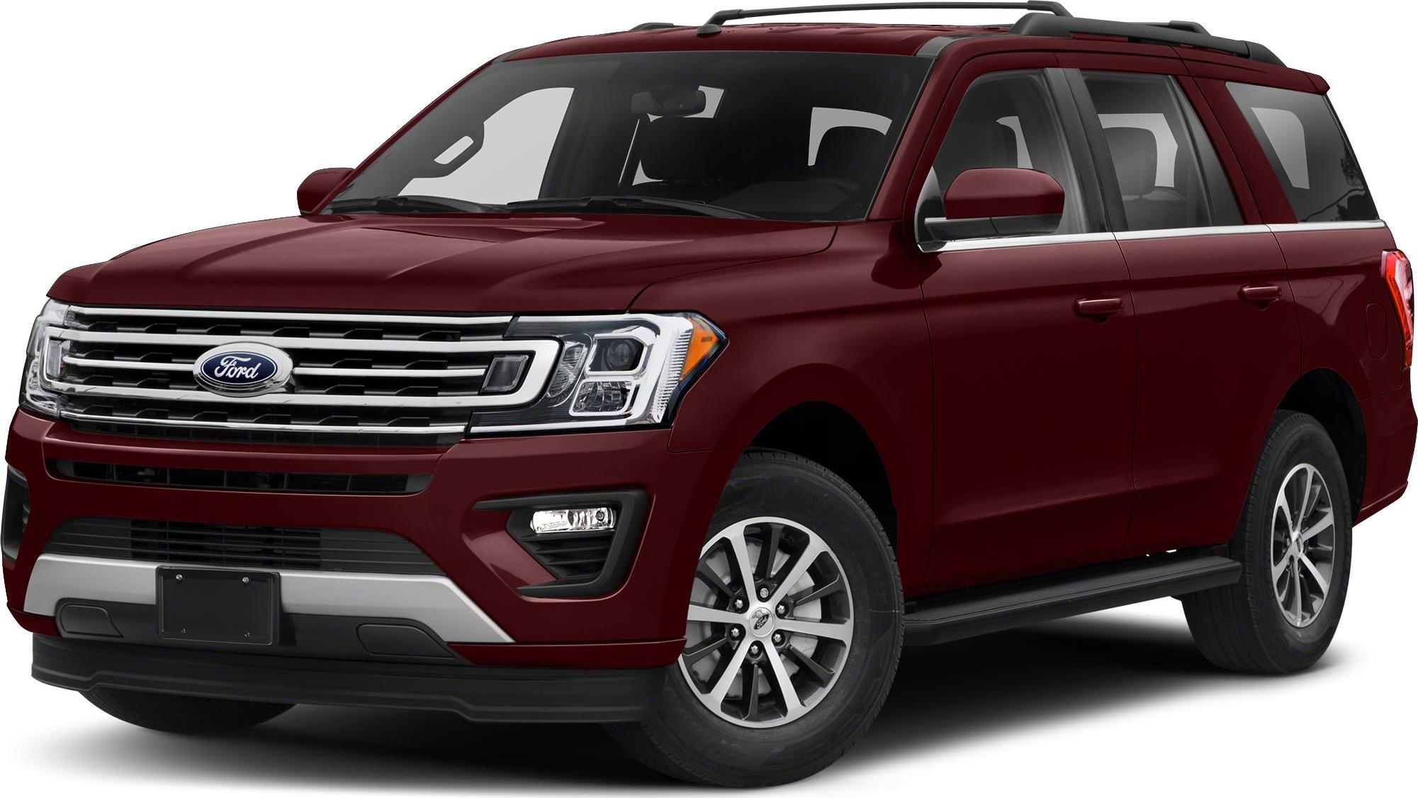 Bold front grille and distinctive headlight design of a large SUV