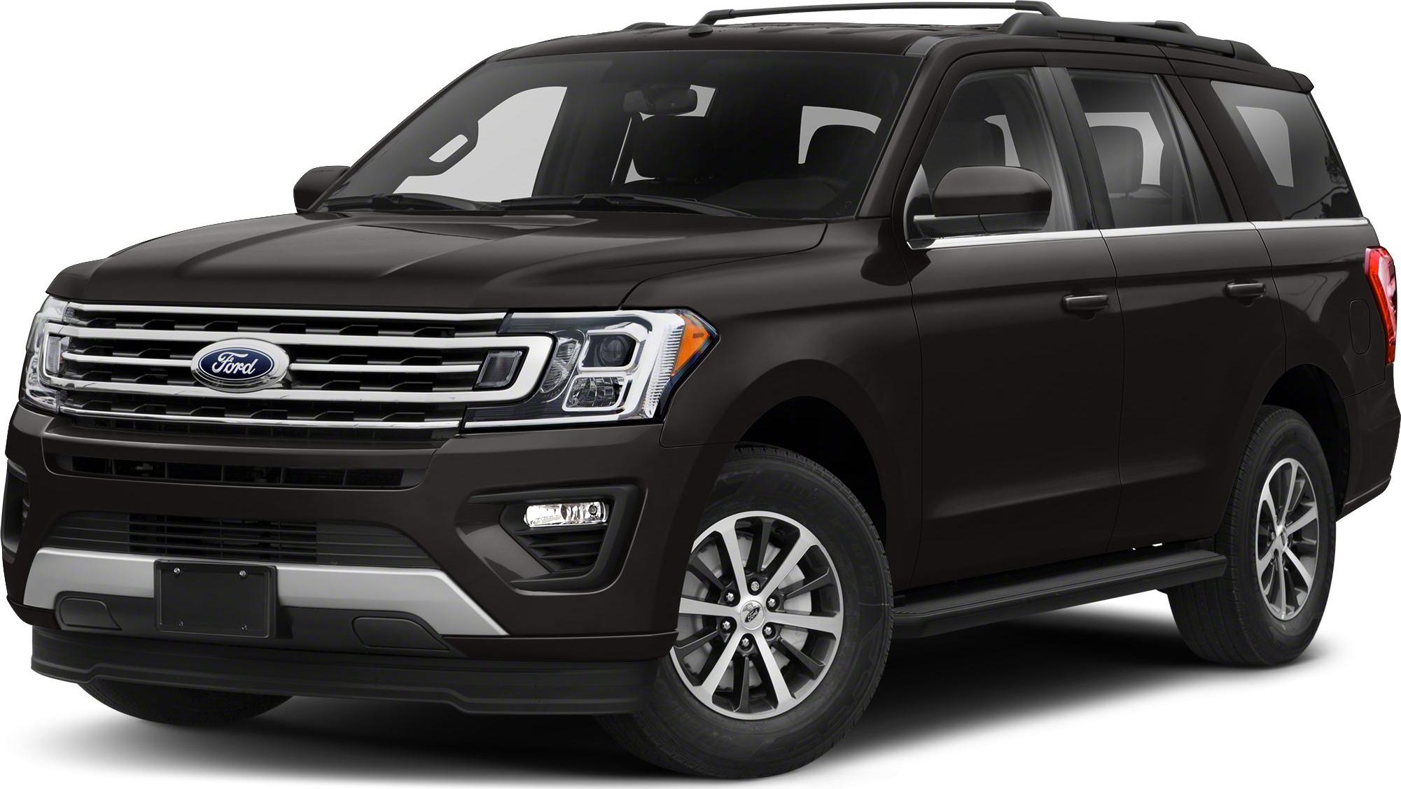 Large SUV with wide chrome grille and roof rails