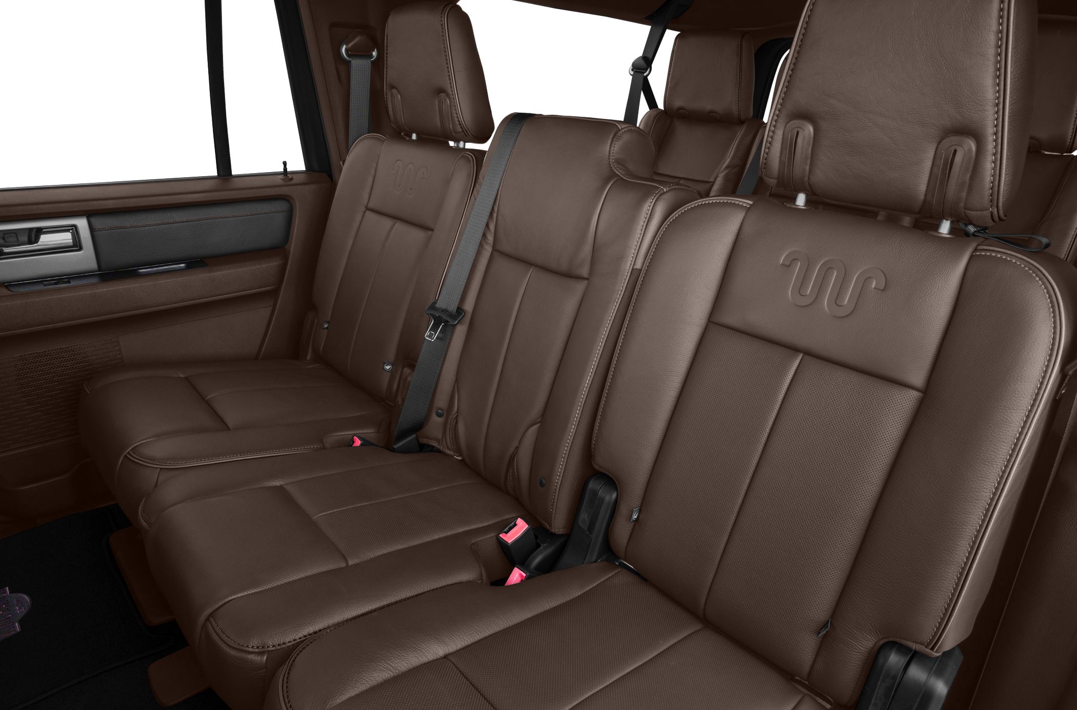 Brown leather rear seats with embossed detail and seat belts