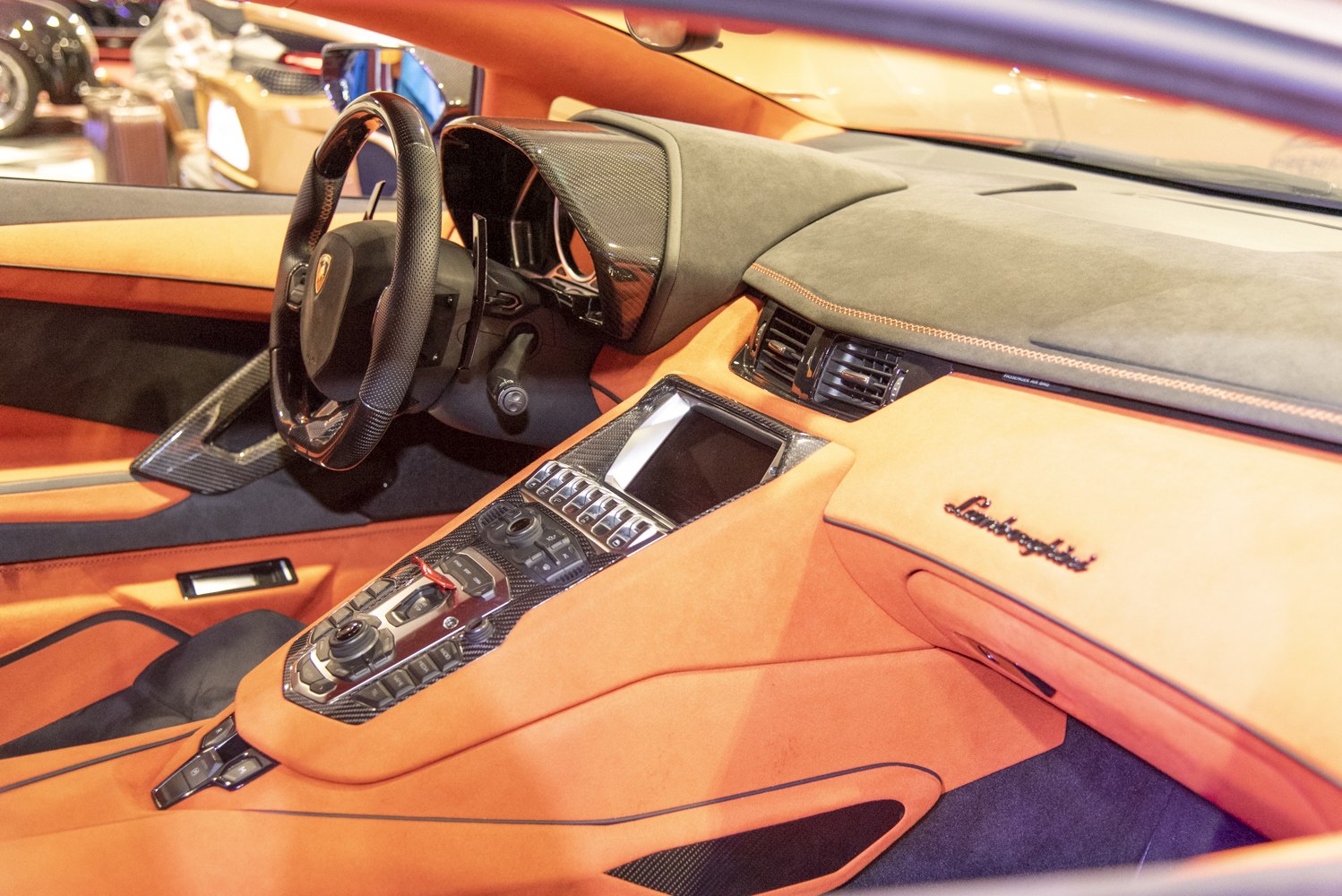 Luxury sports car interior with carbon fiber and advanced center console