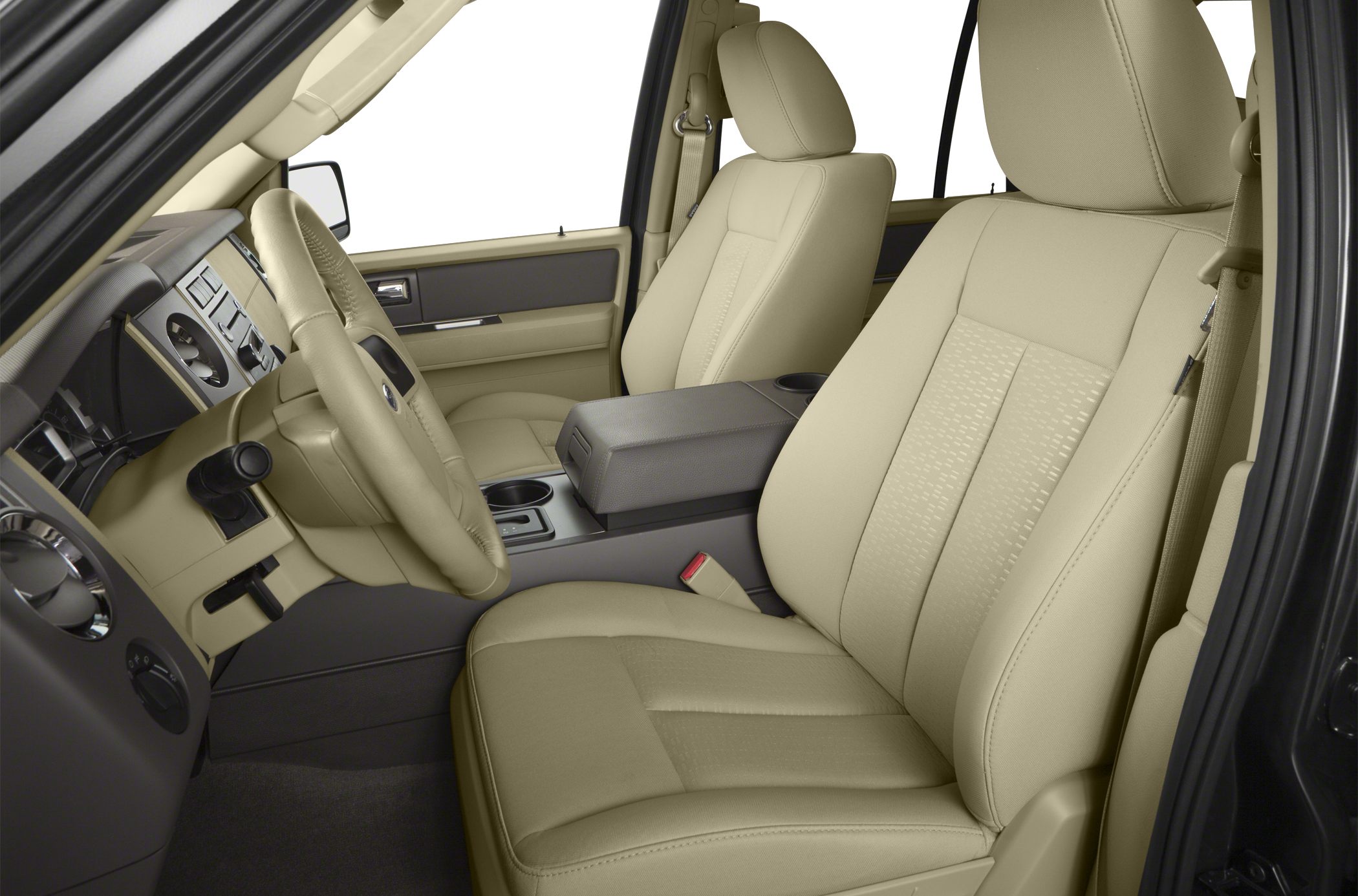Beige front seats, steering wheel, and dashboard interior