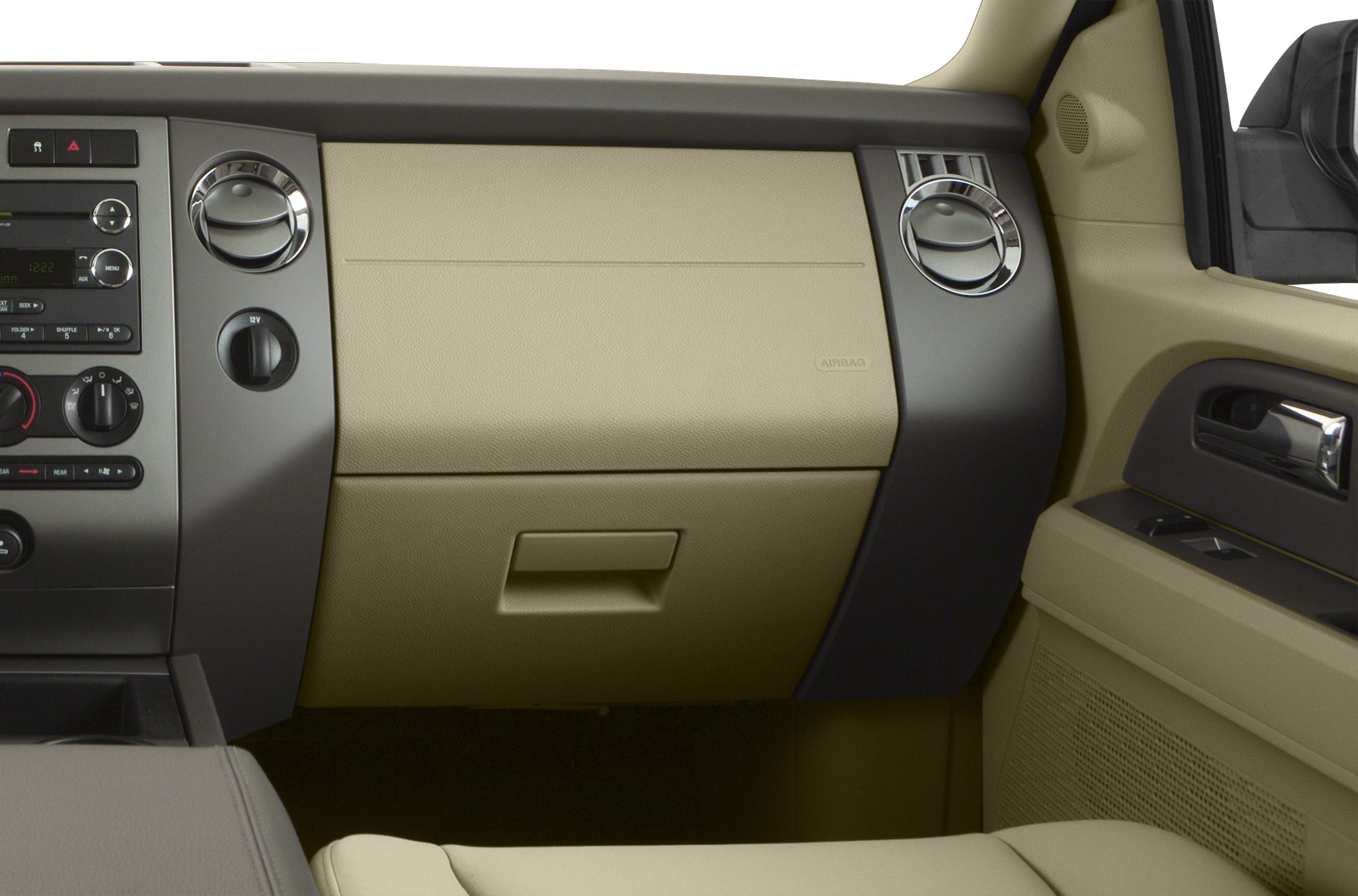 Beige dashboard with ventilation and control knobs, glove compartment