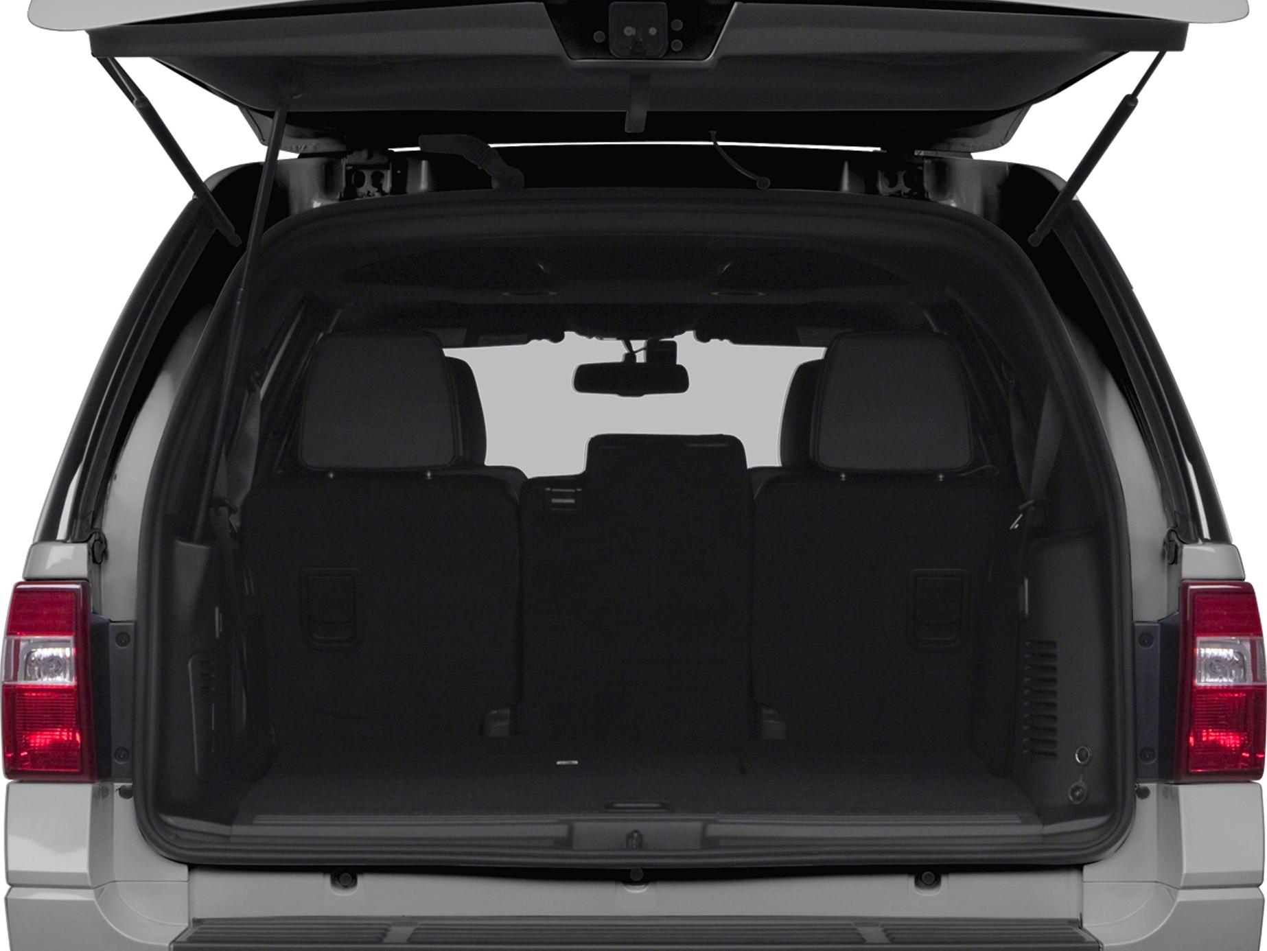 Spacious rear cargo area with open tailgate and visible rear seats.
