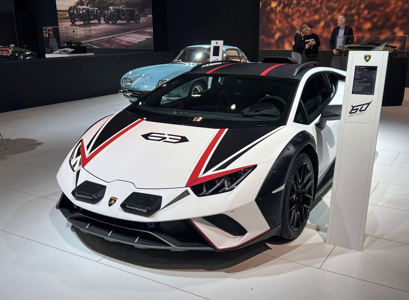 Front view with racing stripes and aggressive aerodynamic design