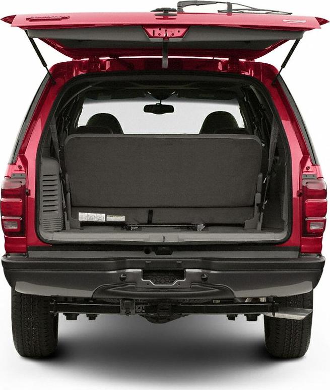 Rear view of SUV with open tailgate and visible rear seats
