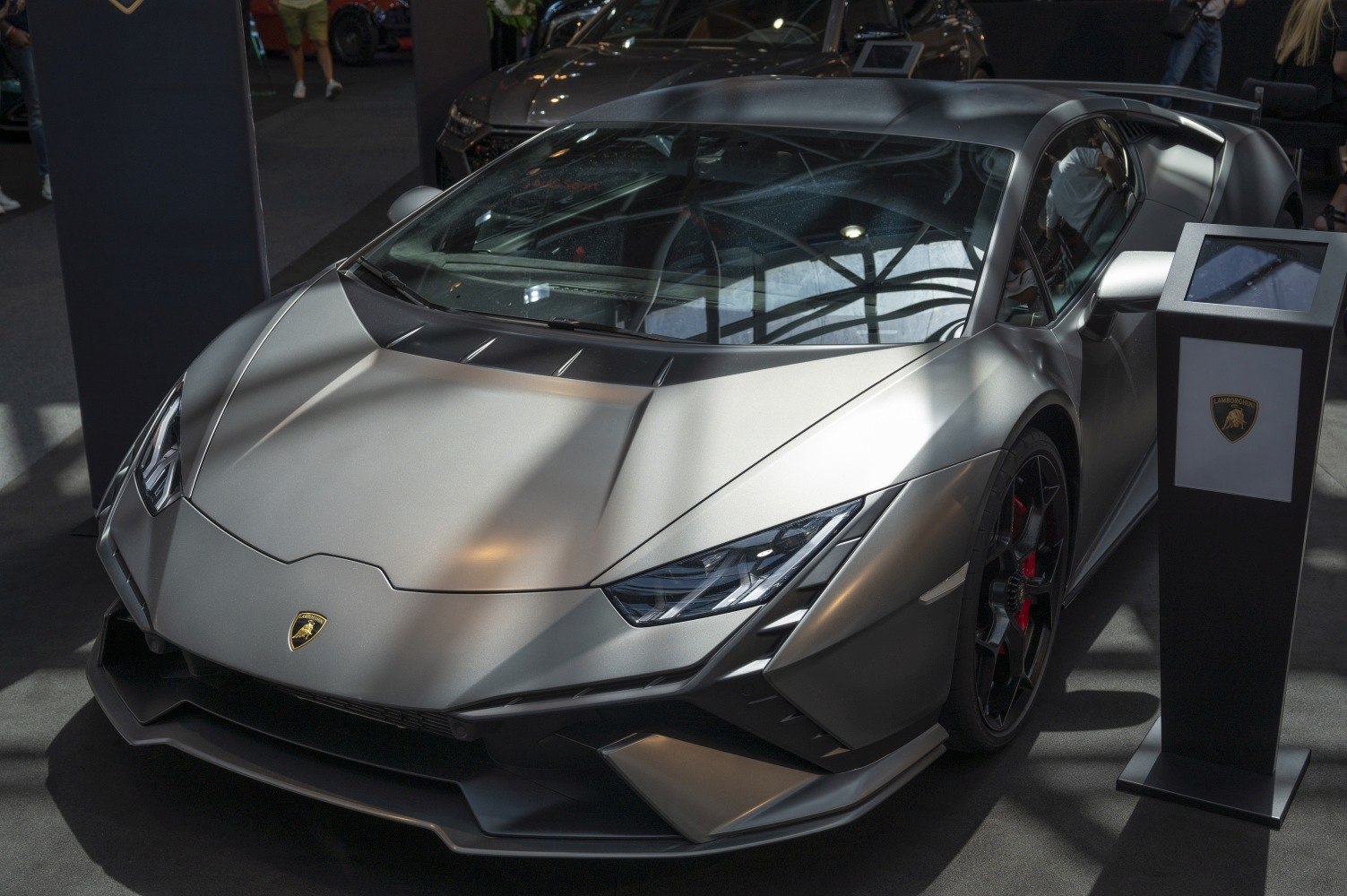 Aggressive aerodynamic front with sharp headlights and angular bumper