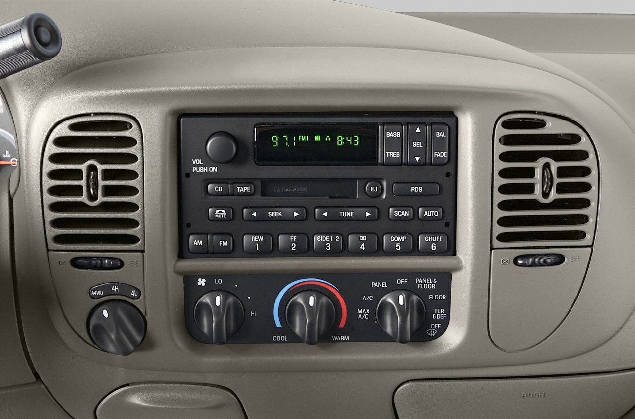 Center console with 4WD selector, tape player, and climate controls