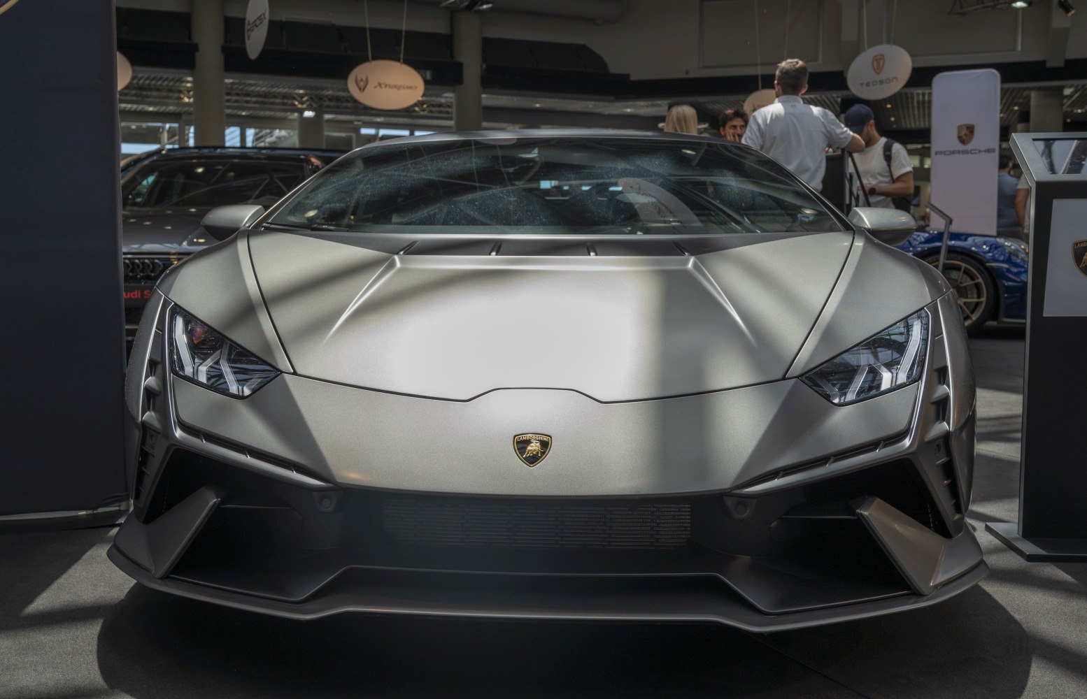 Close-up of aggressive front fascia with sleek headlights and aerodynamic features