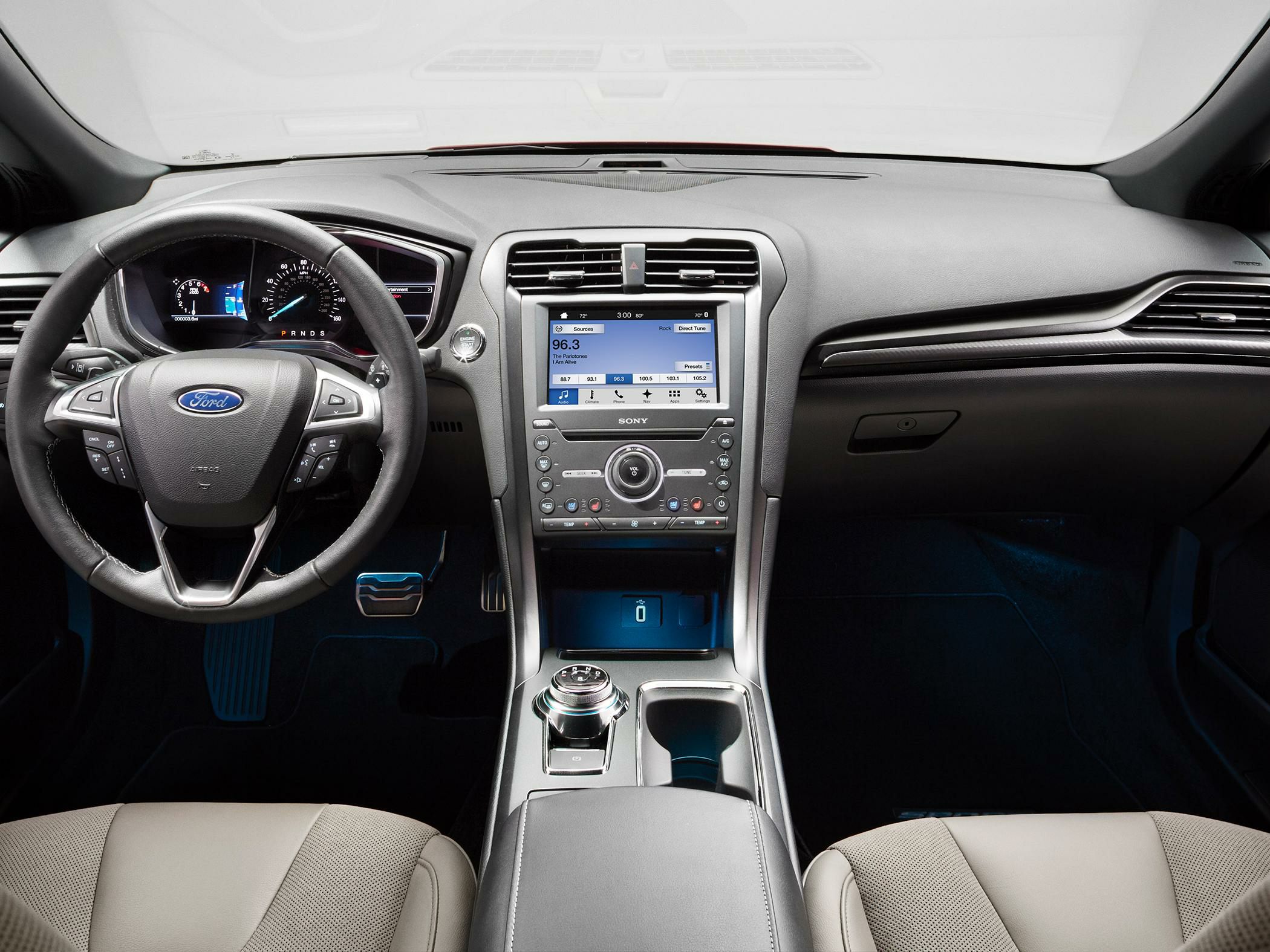 Modern car interior with touchscreen dashboard and multifunction steering wheel
