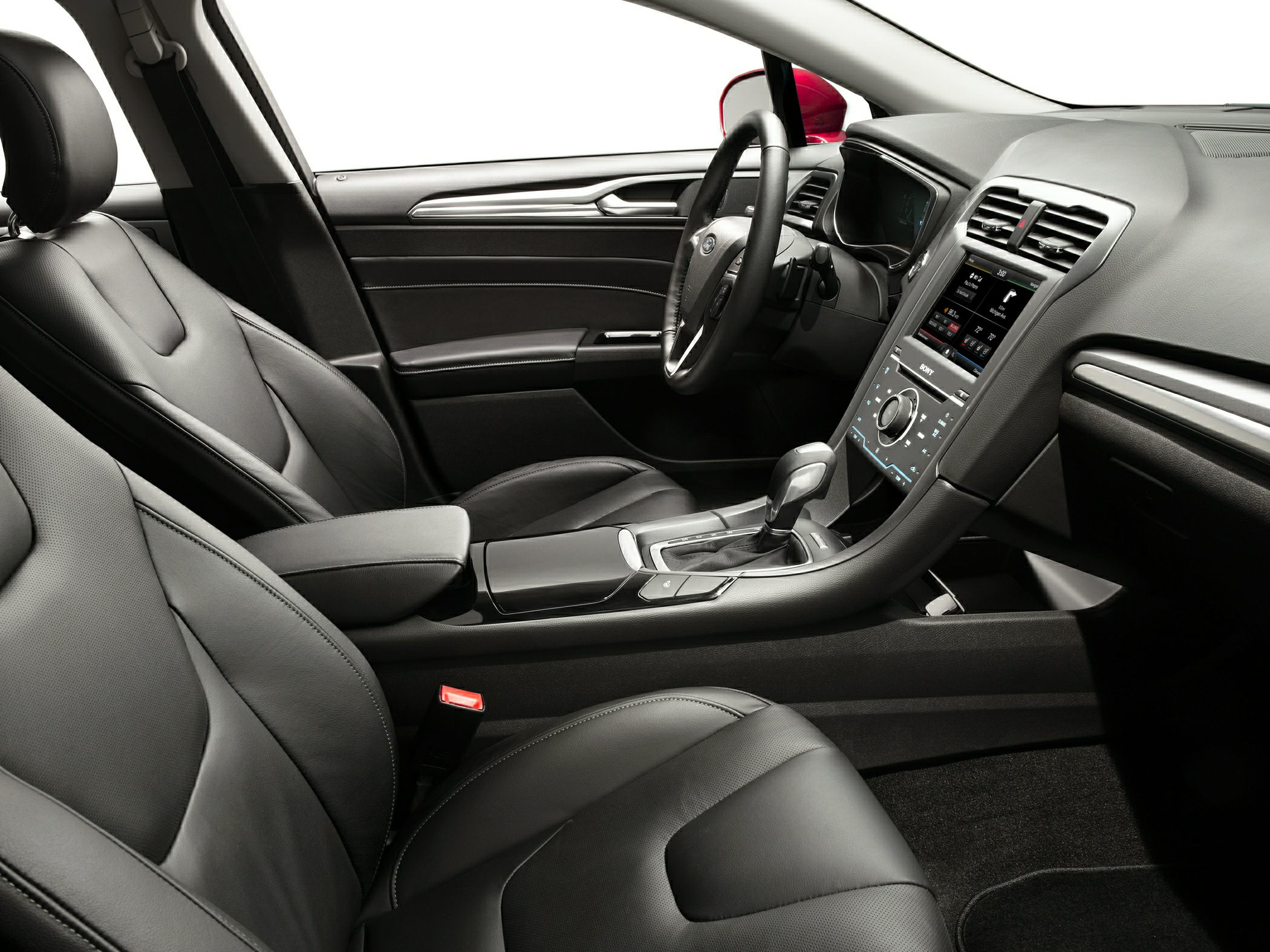Modern car interior with touchscreen dashboard and leather seats