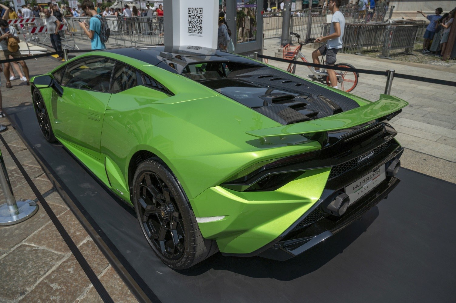 Green Lamborghini with aggressive rear wing and sharp rear design