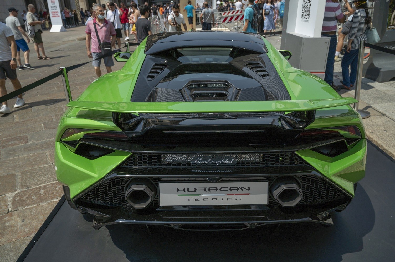 Rear view with dual hexagonal exhausts and visible engine bay