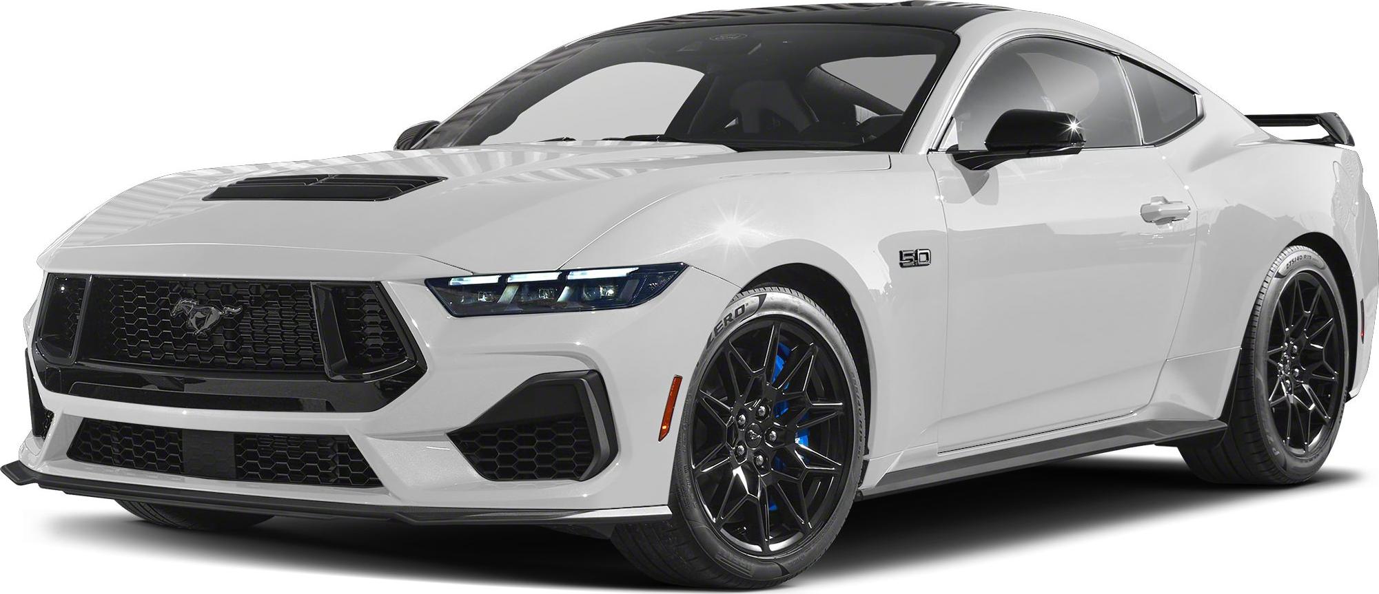 Aerodynamic white coupe with 5.0 V8 badge and black alloy wheels