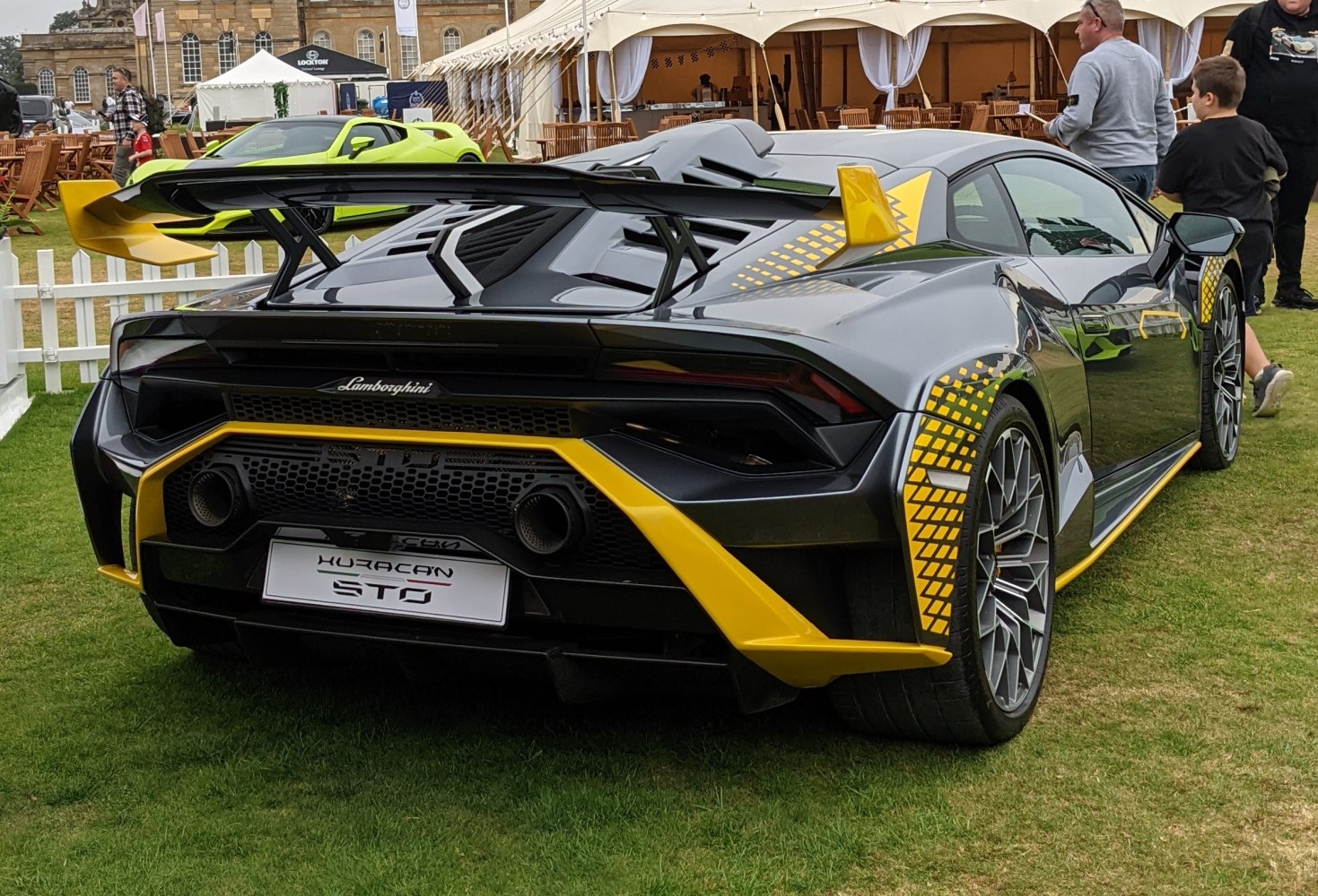 Rear view with large aerodynamic spoiler and yellow patterned accents