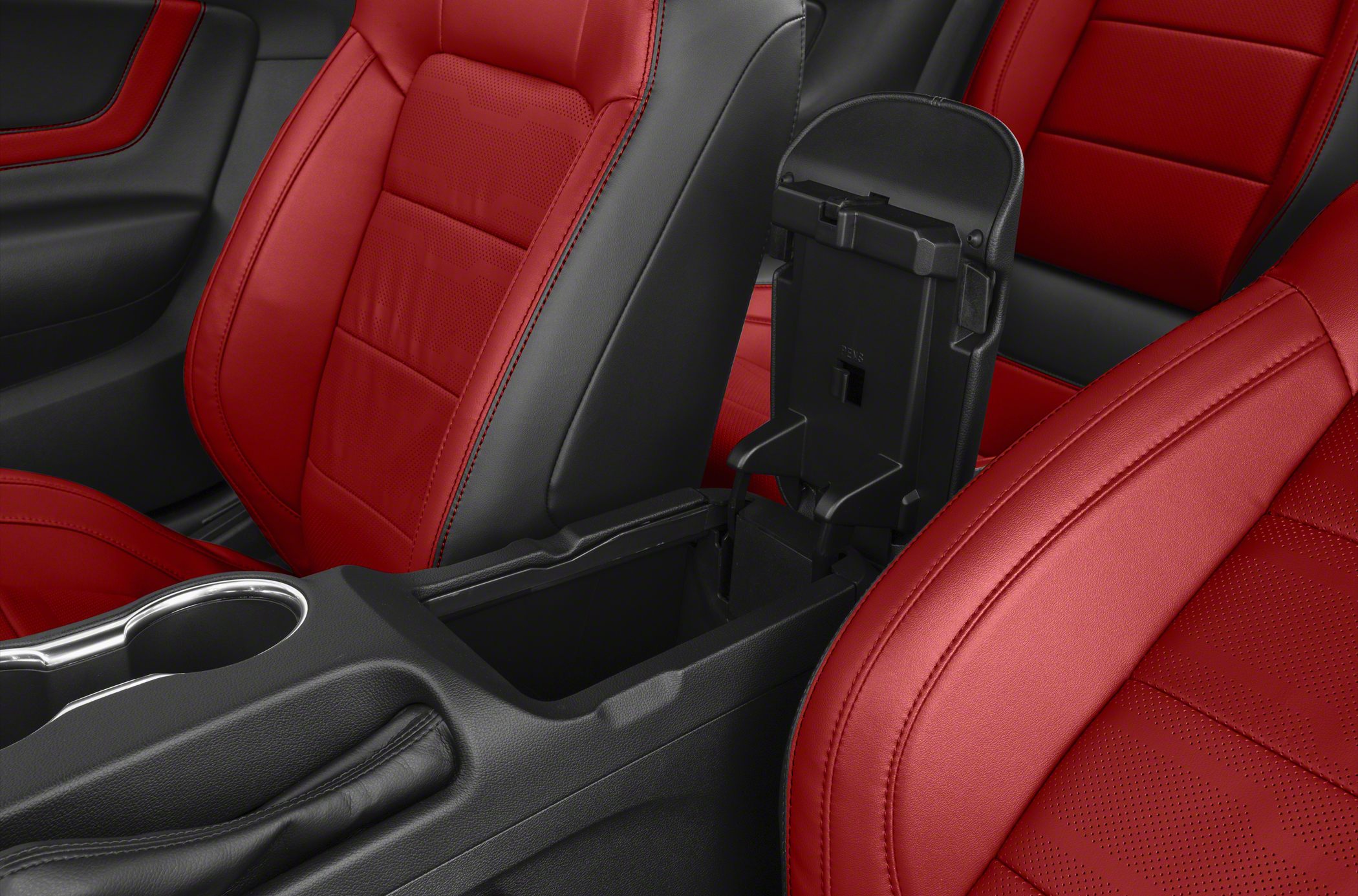 Red and black perforated car seats and center console storage