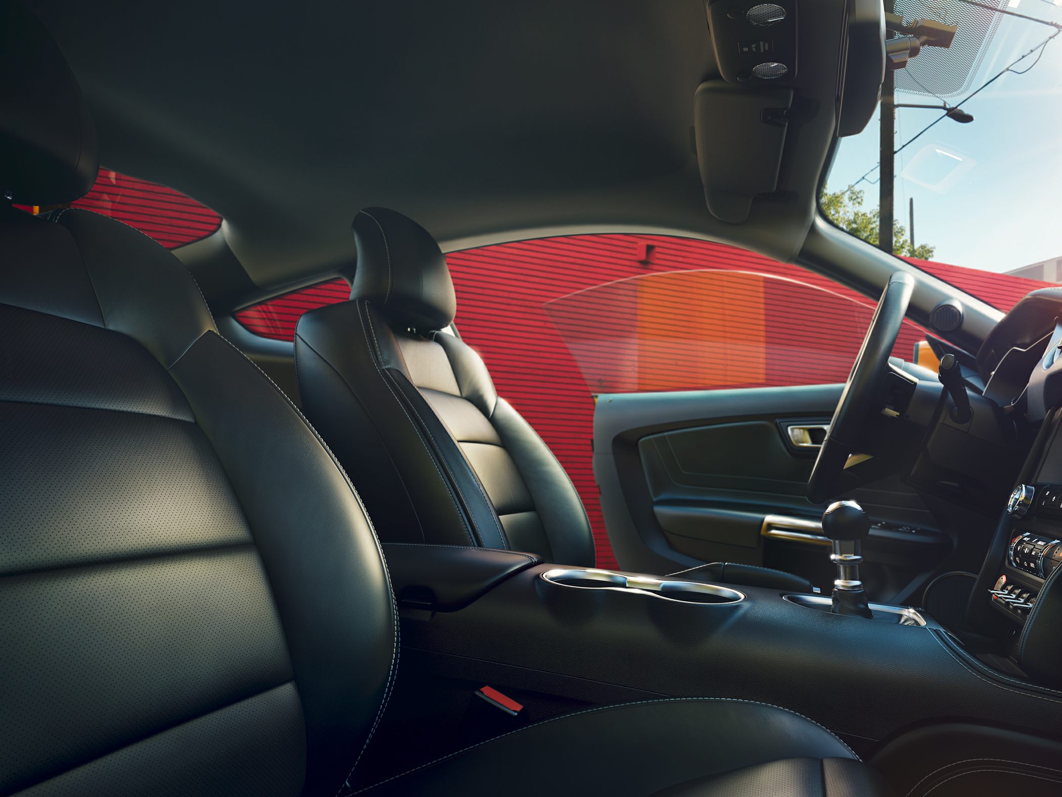 Luxury black leather seats and center console with gear shift