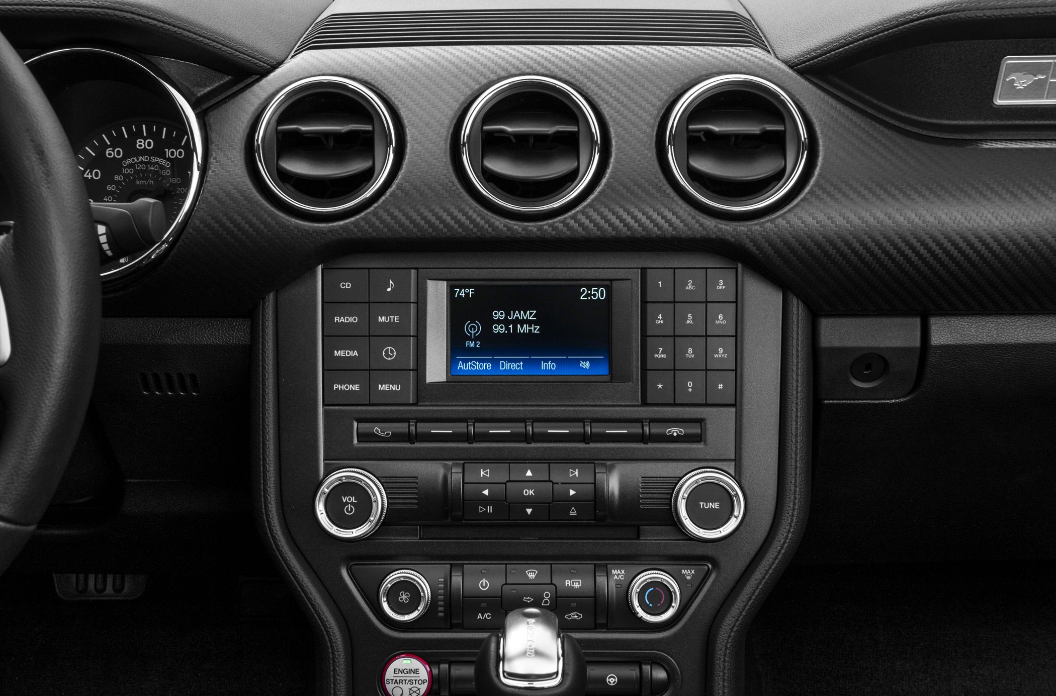 Dashboard with infotainment system, air vents, and control buttons