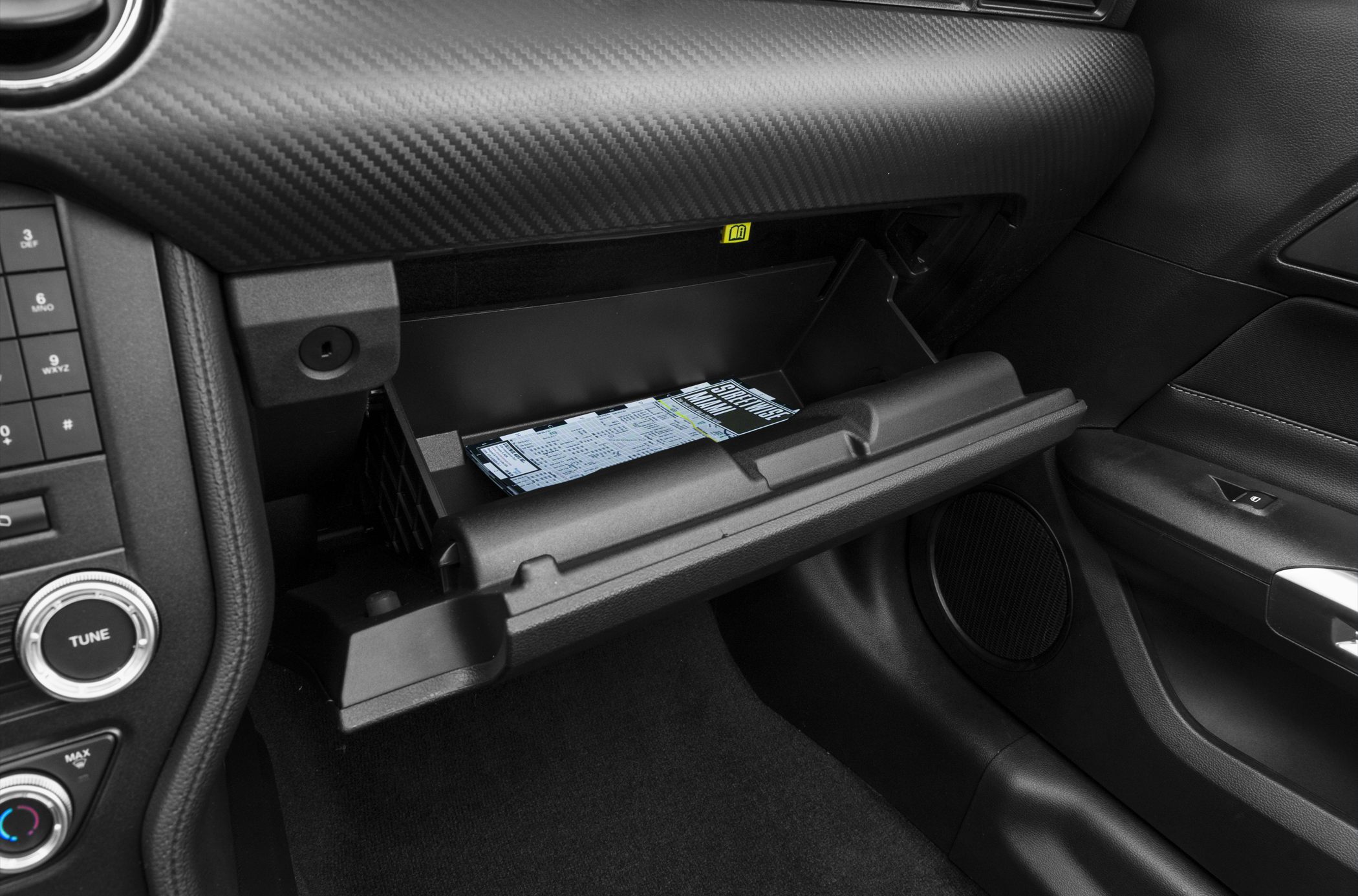 Open glove compartment and carbon fiber dashboard trim