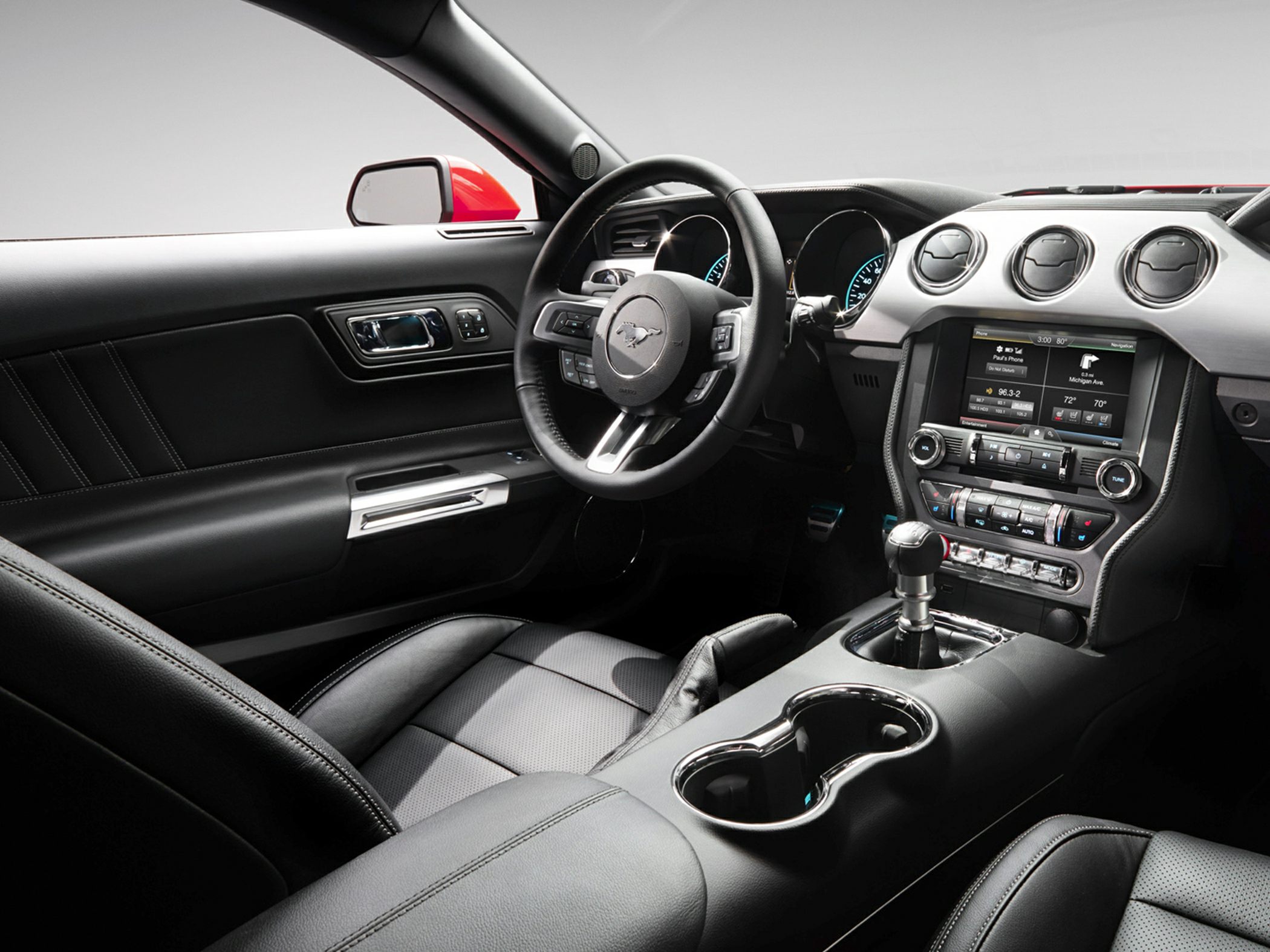 Manual transmission and modern dashboard with infotainment system