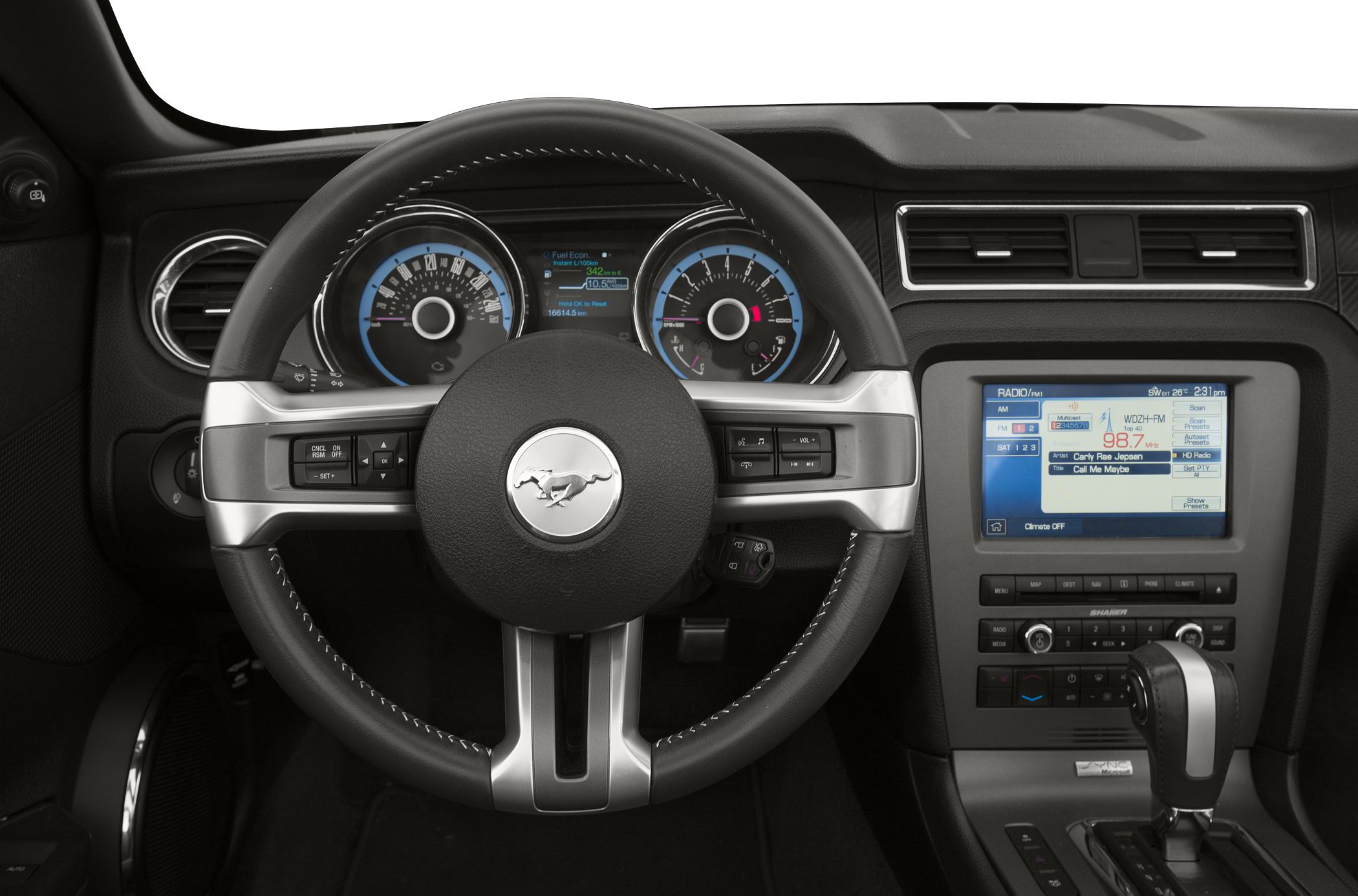 Steering wheel and dashboard with digital displays and gear shift