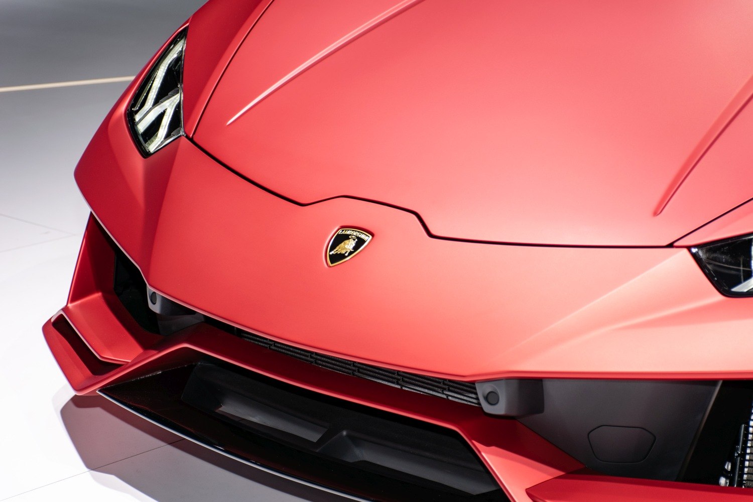 Close-up of aggressive front bumper and LED headlights