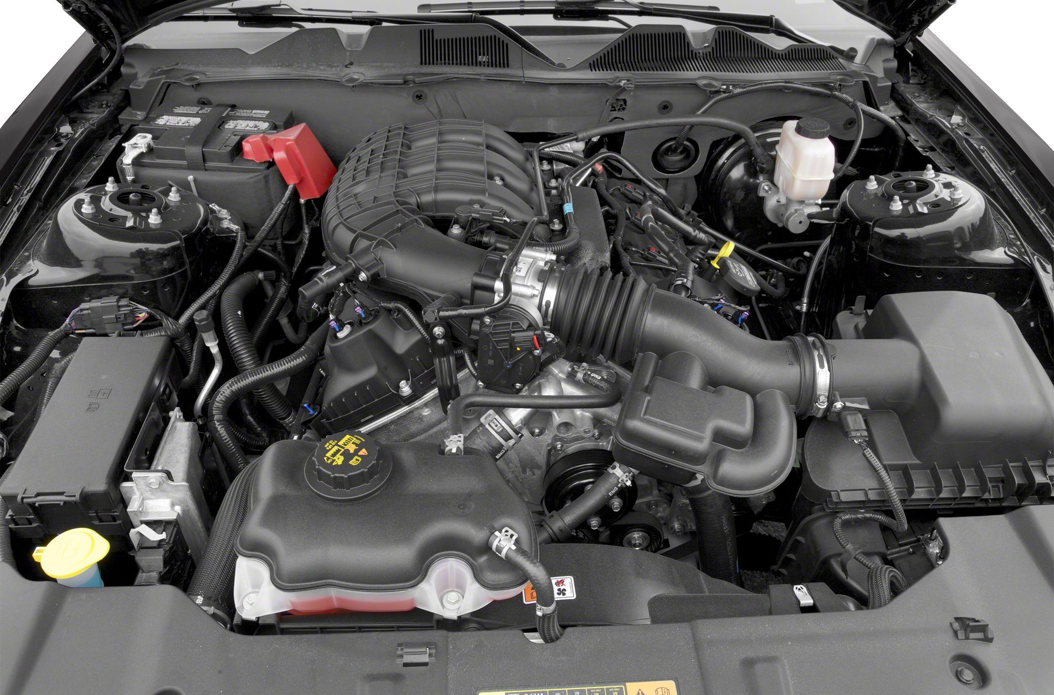 Engine bay with air intake system and battery installation