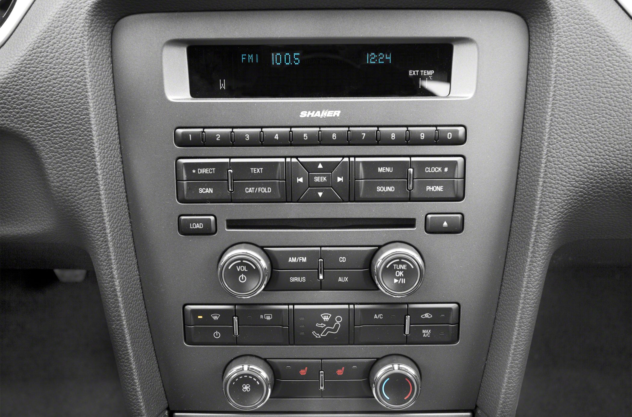 Audio and climate control panel with radio, CD, and temperature display