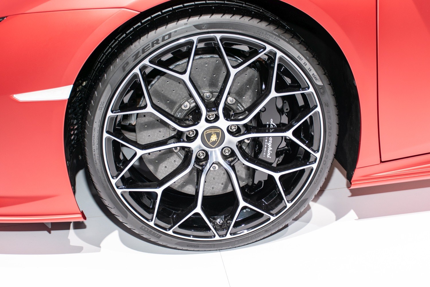 Close-up of alloy wheel and carbon ceramic brake assembly