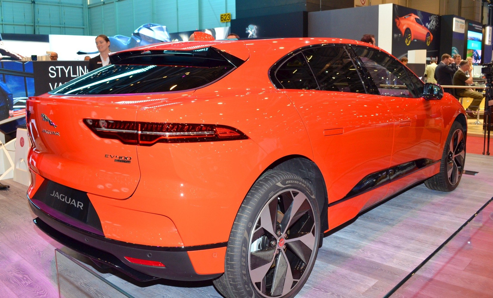 Rear and side view showcasing taillights and alloy wheels