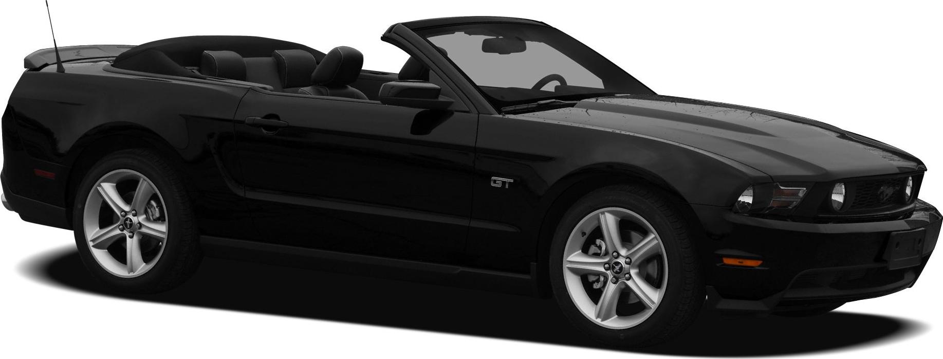 Black convertible with GT badge, five-spoke alloy wheels, and classic front grille.