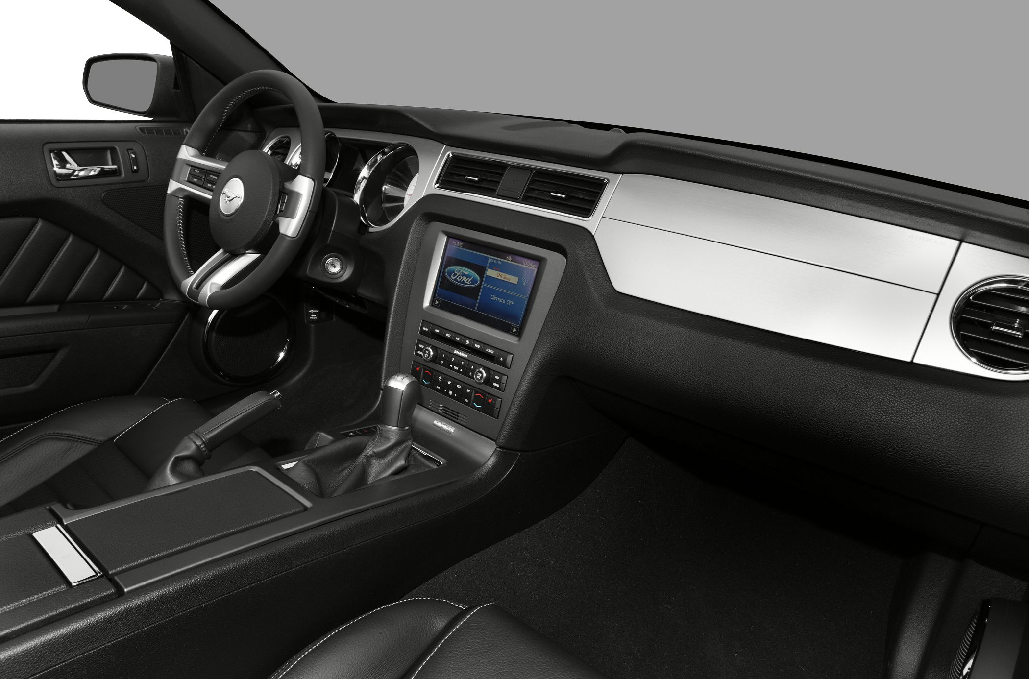Interior dashboard and center console with touchscreen and leather details
