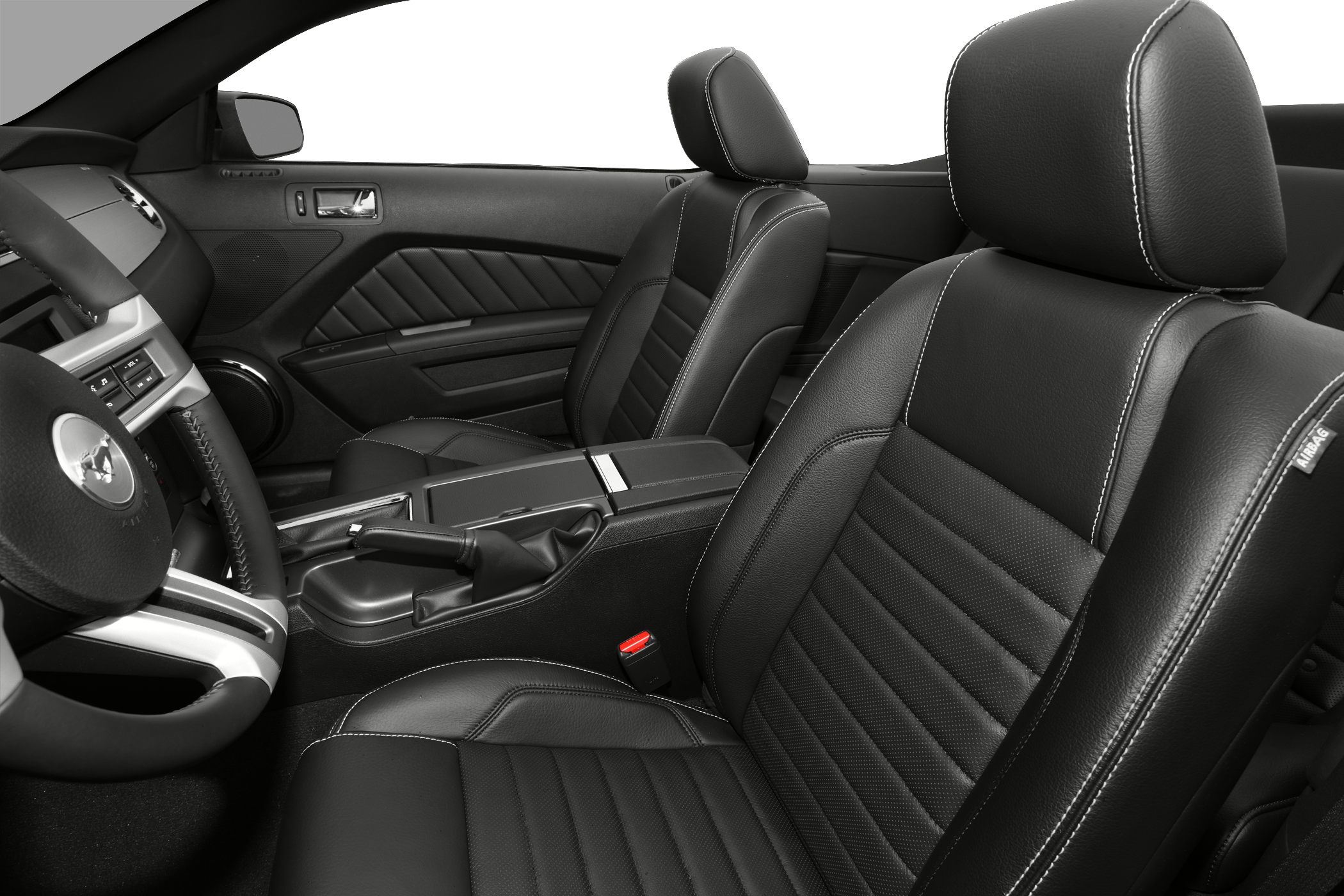 Black leather seats with white stitching and sport car interior details
