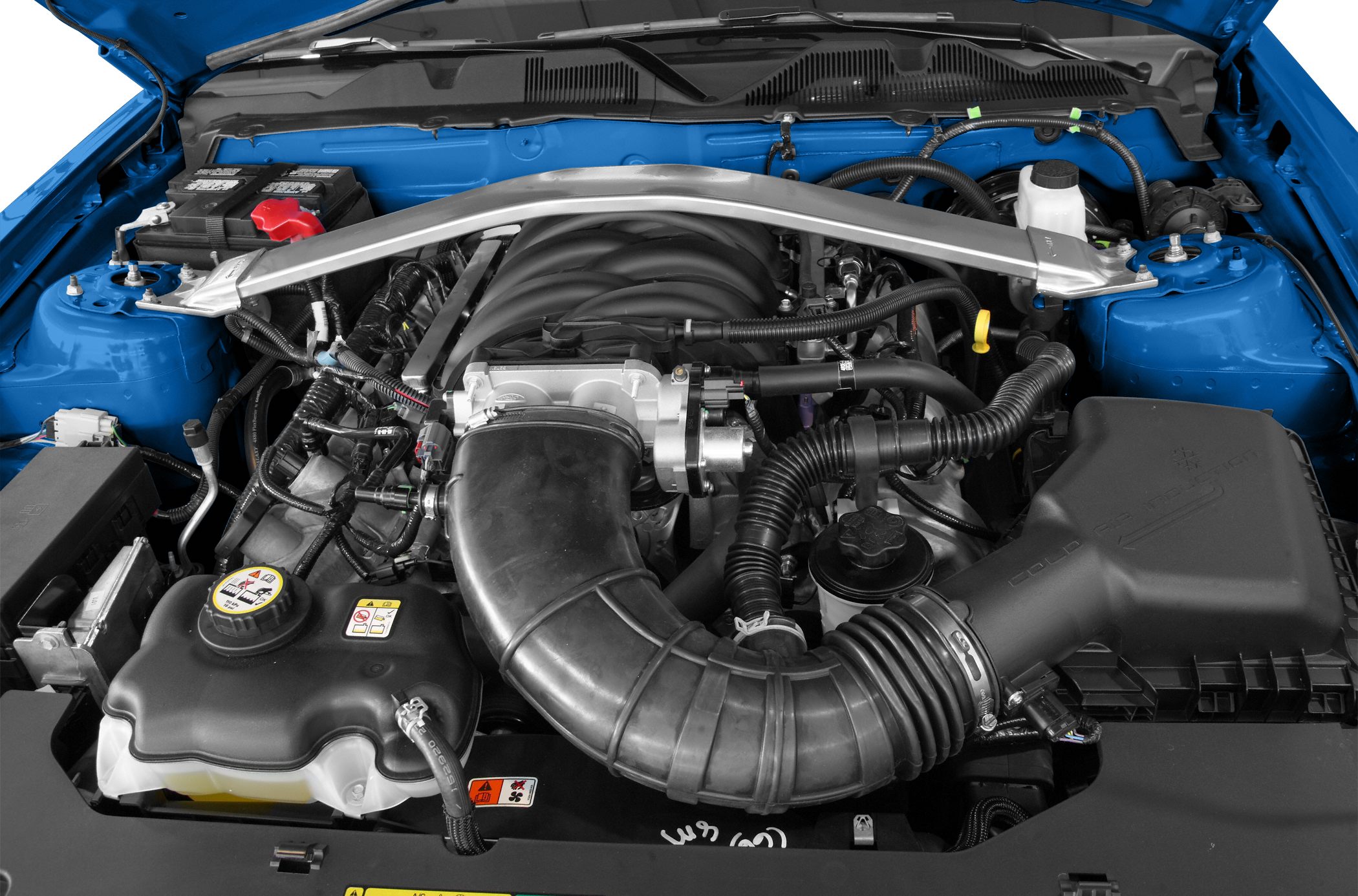 Engine bay with strut bar and air intake system