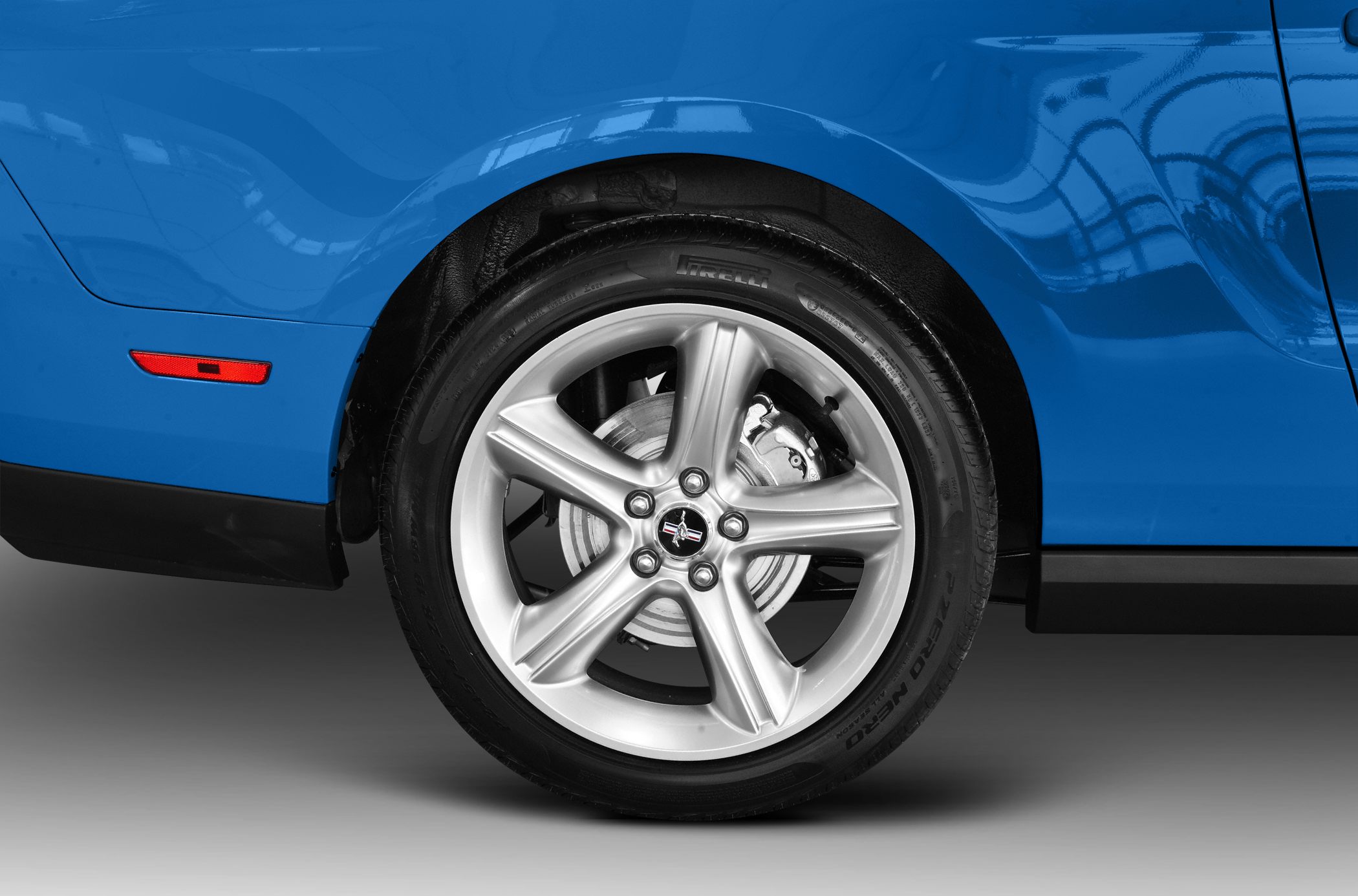 5-spoke alloy wheel with Pirelli P Zero Nero tire and brake disc