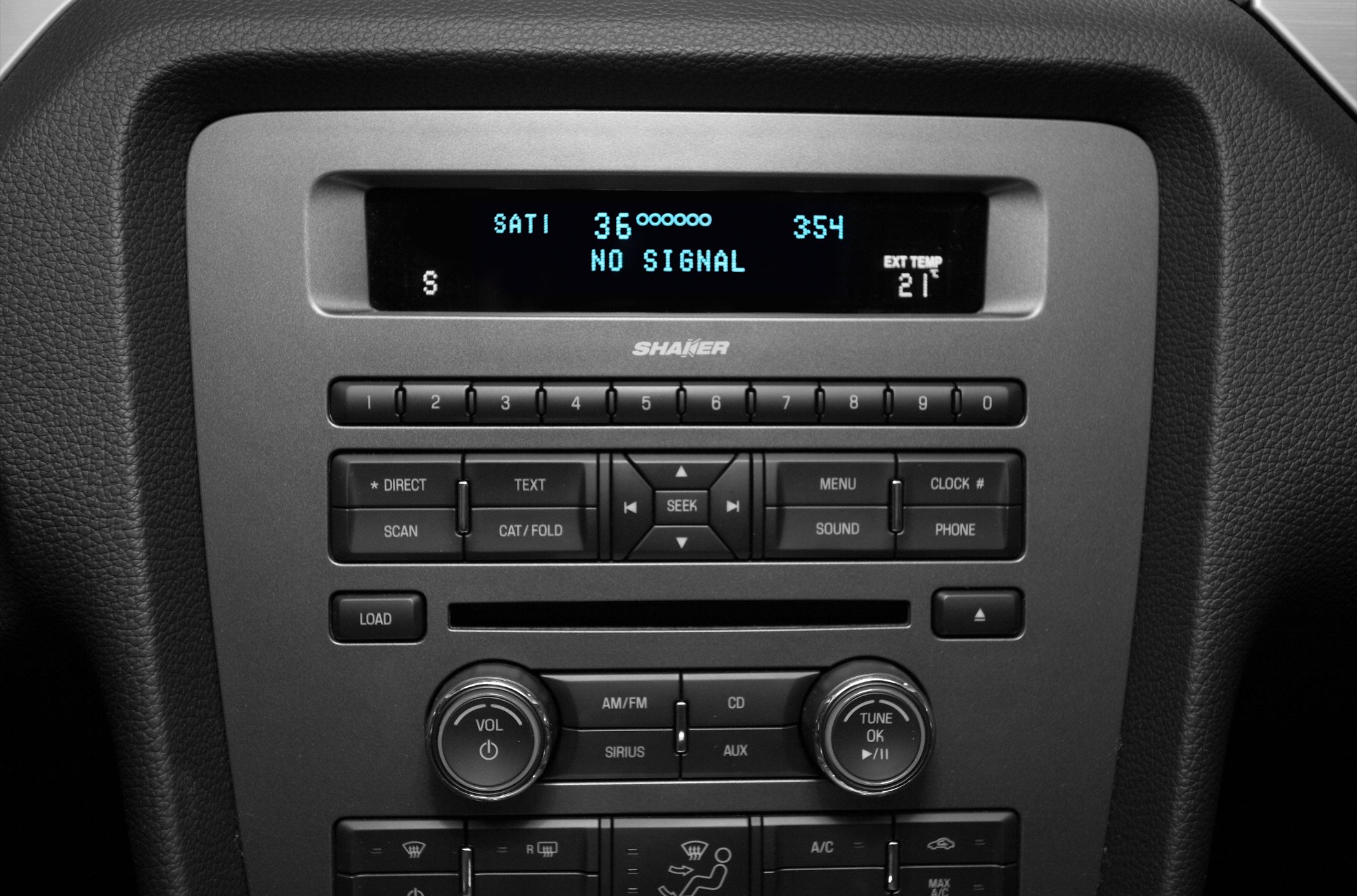 Close-up of Shaker audio system and climate control panel