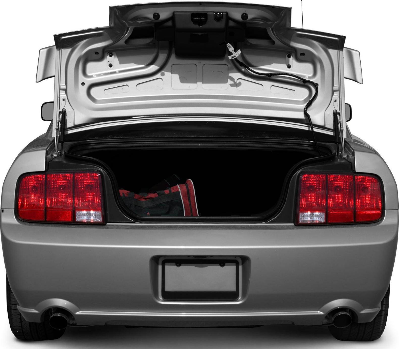 Open trunk rear view with taillights and dual exhaust