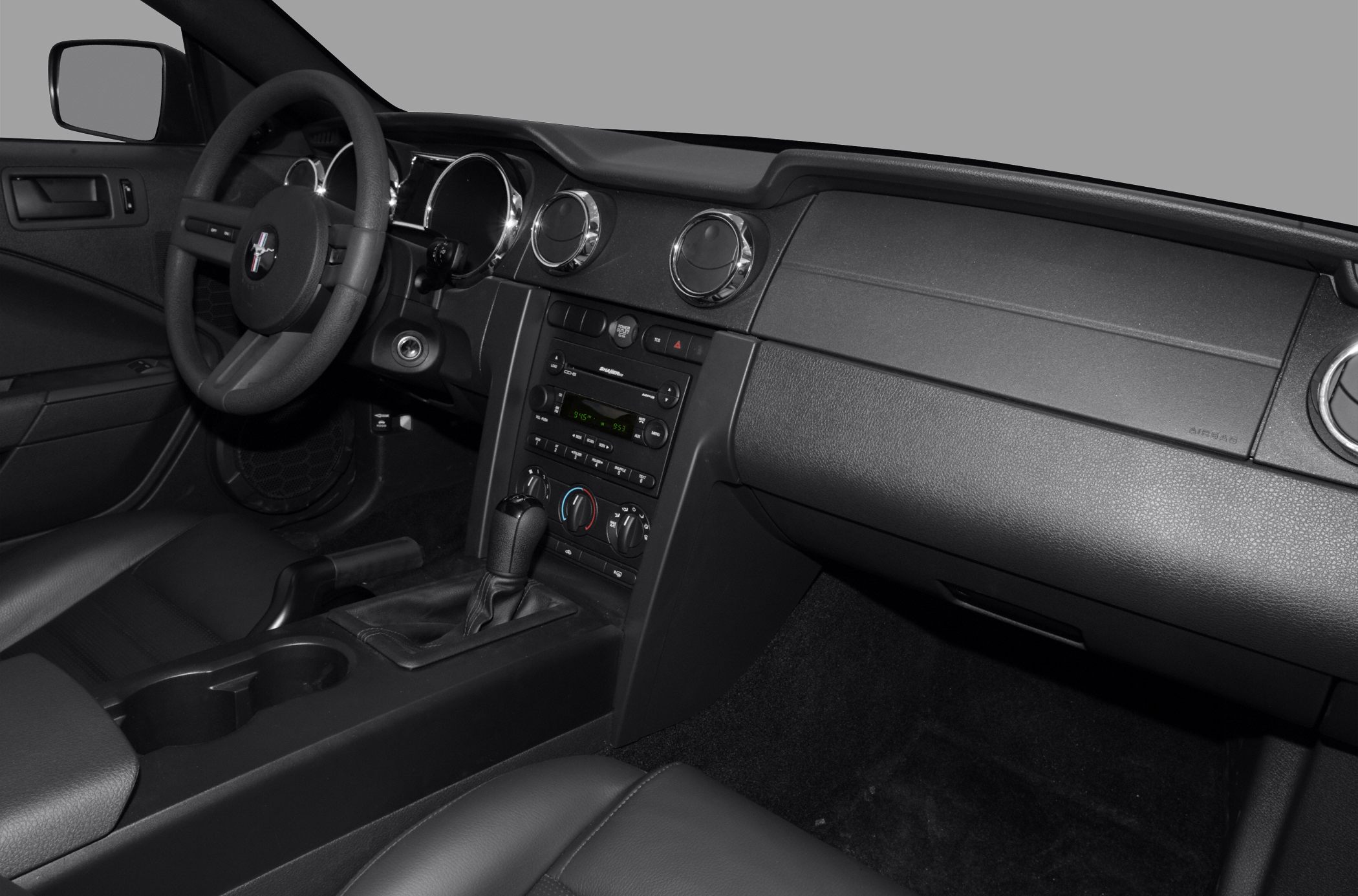 Classic dashboard with analog gauges and manual gear stick