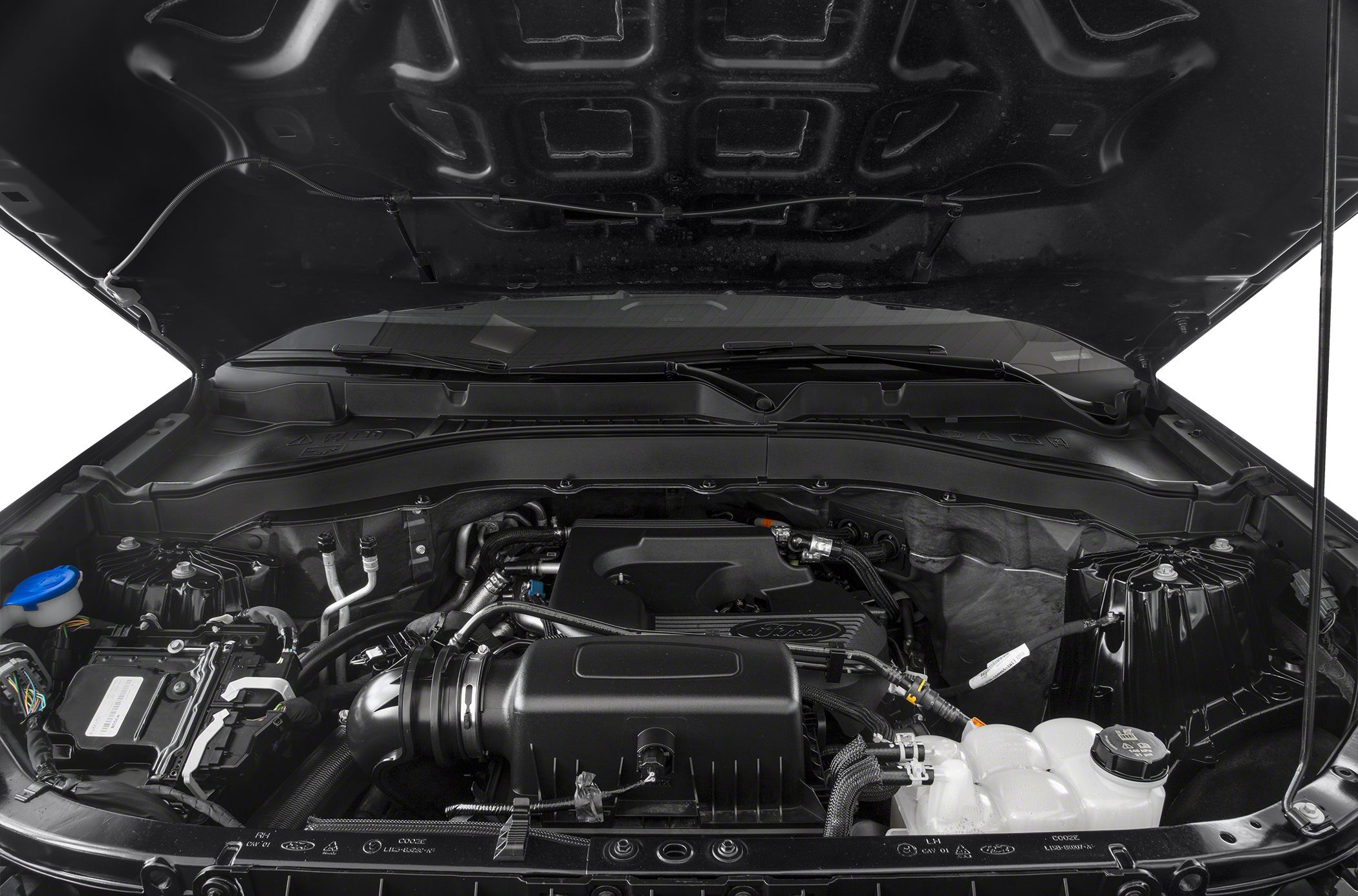 Modern SUV engine compartment with detailed components and fluid reservoirs.