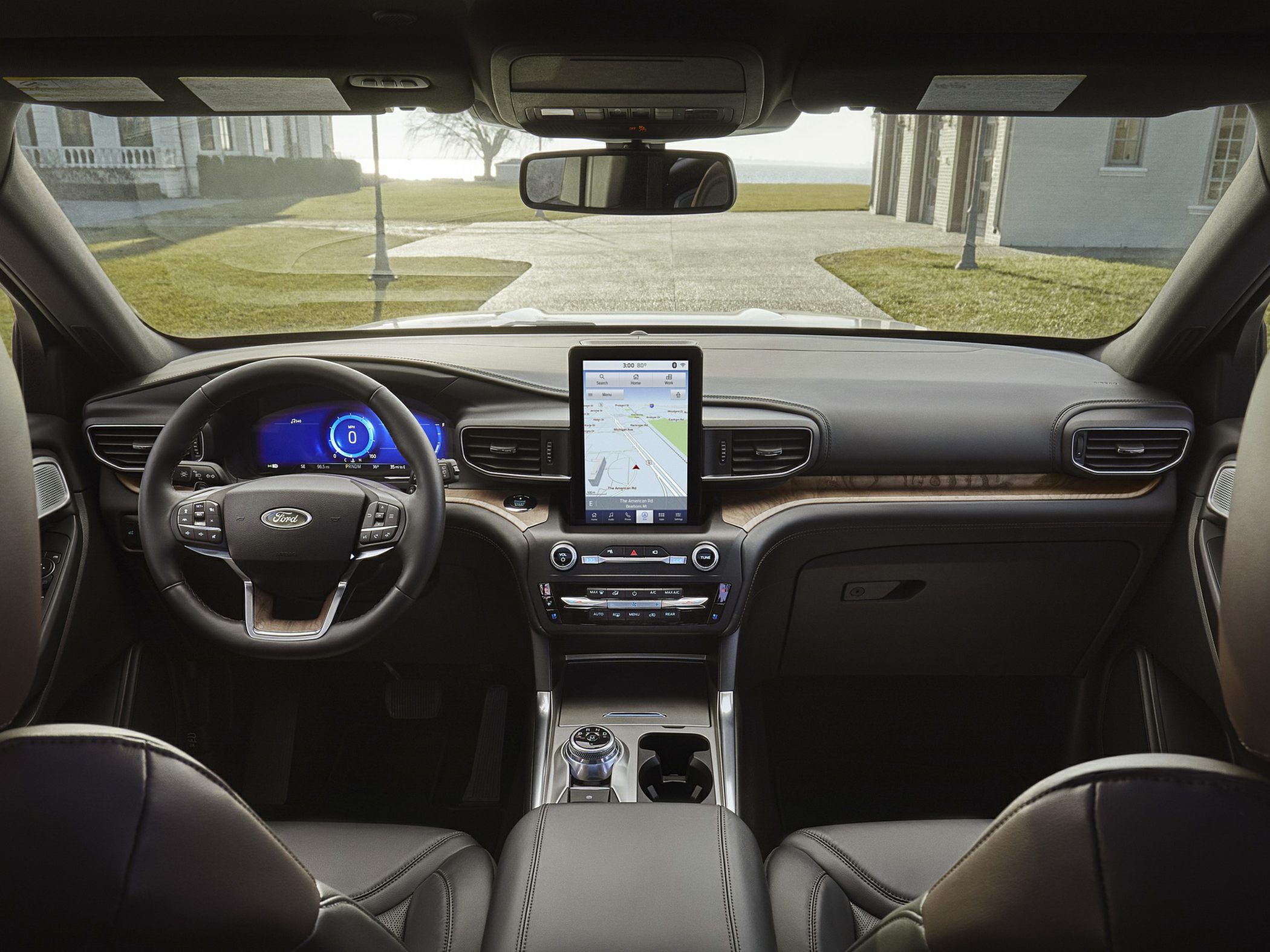 Digital instrument cluster and vertical touchscreen navigation system in premium SUV interior
