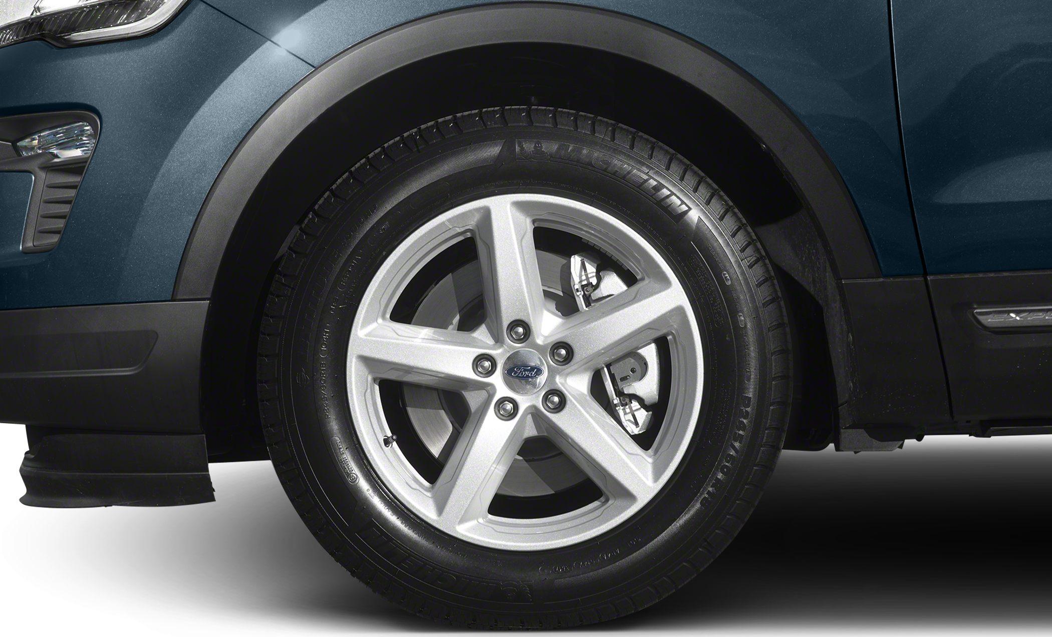 Close-up of alloy wheel with visible brake disc and tire tread