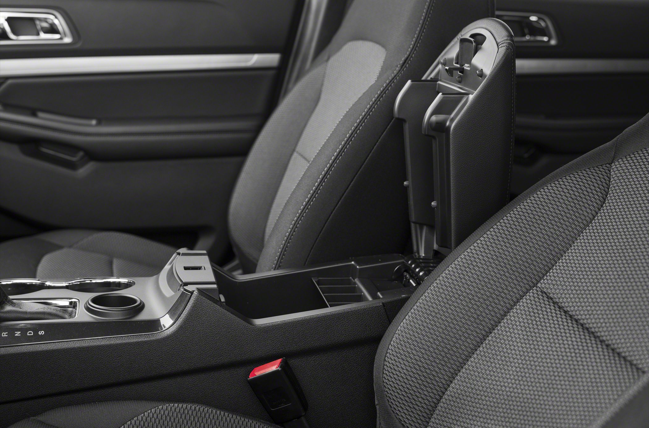 Center console storage and fabric seats with armrest