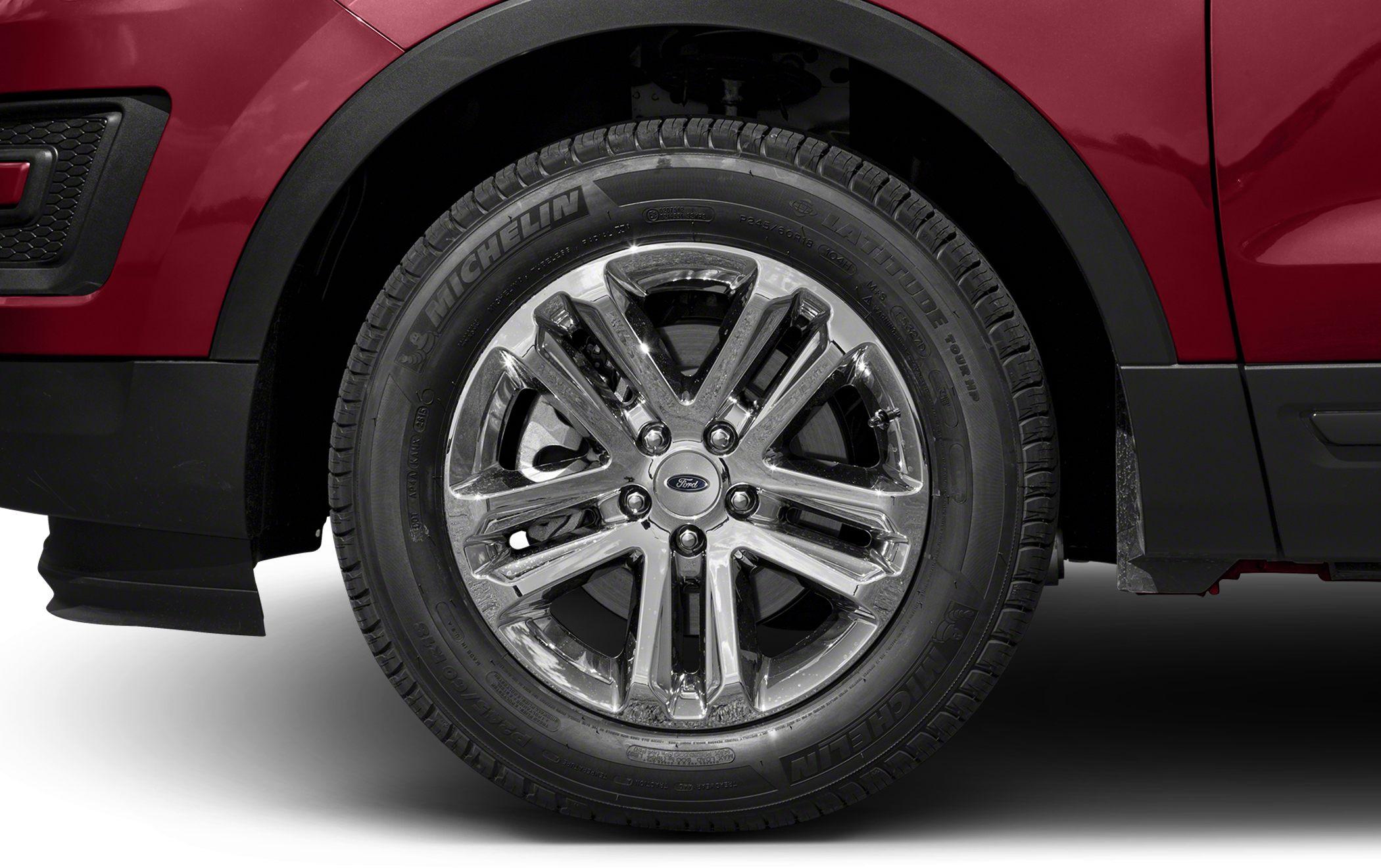 Chrome alloy wheel with Michelin tire on SUV