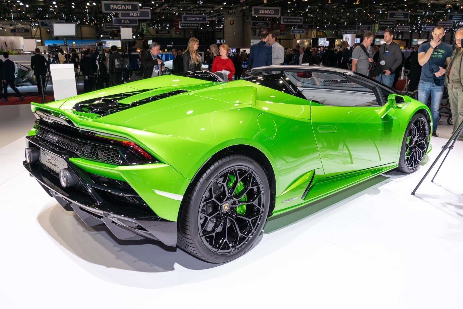 Green convertible sports with black alloy wheels and aerodynamic rear
